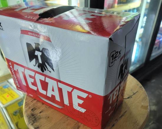 Order Tecate 12pk. 12oz. Cans  food online from Hub Market & Deli store, San Diego on bringmethat.com