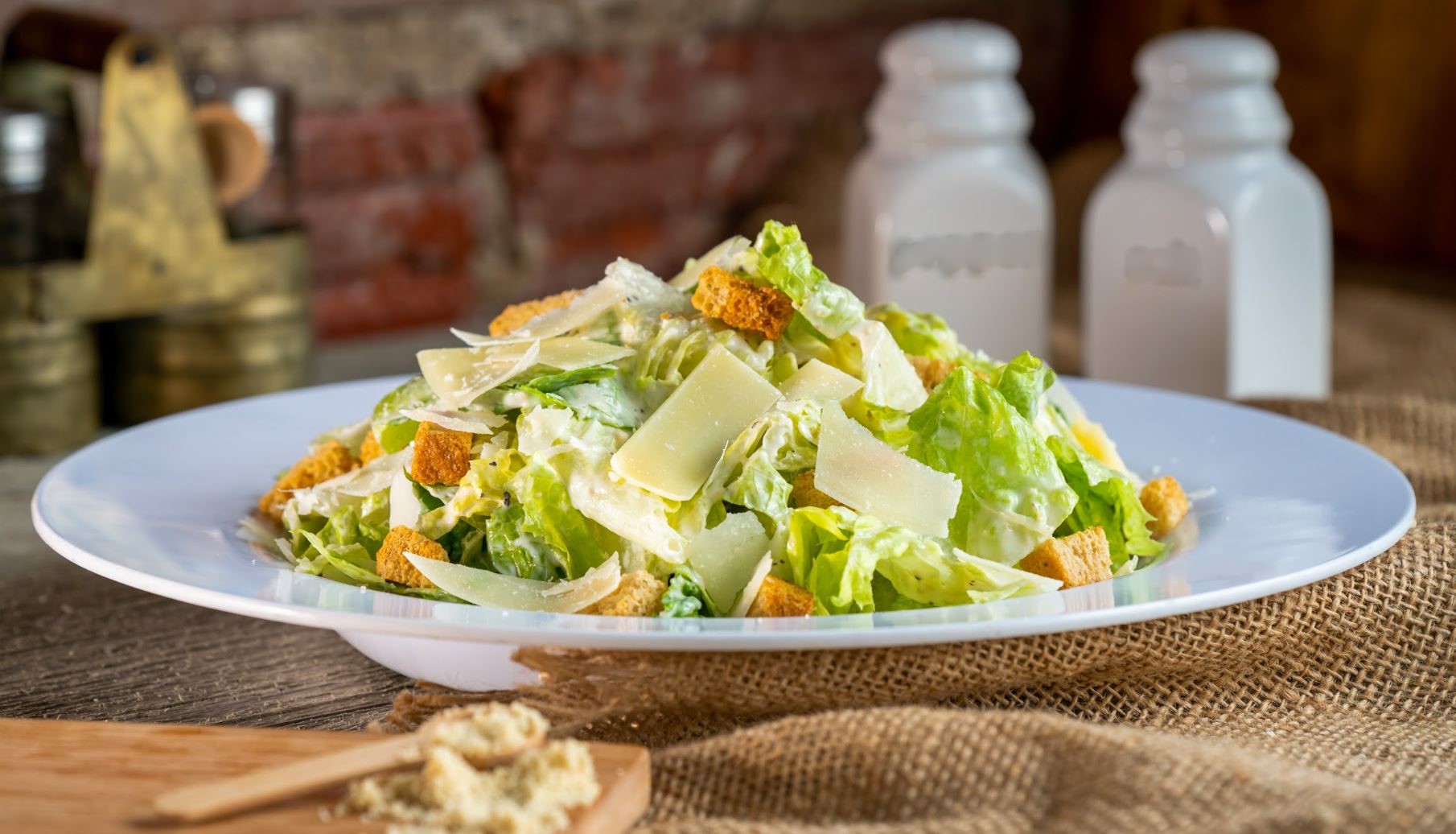 Order Caesar Salad food online from The Butcher Grille store, Dearborn on bringmethat.com