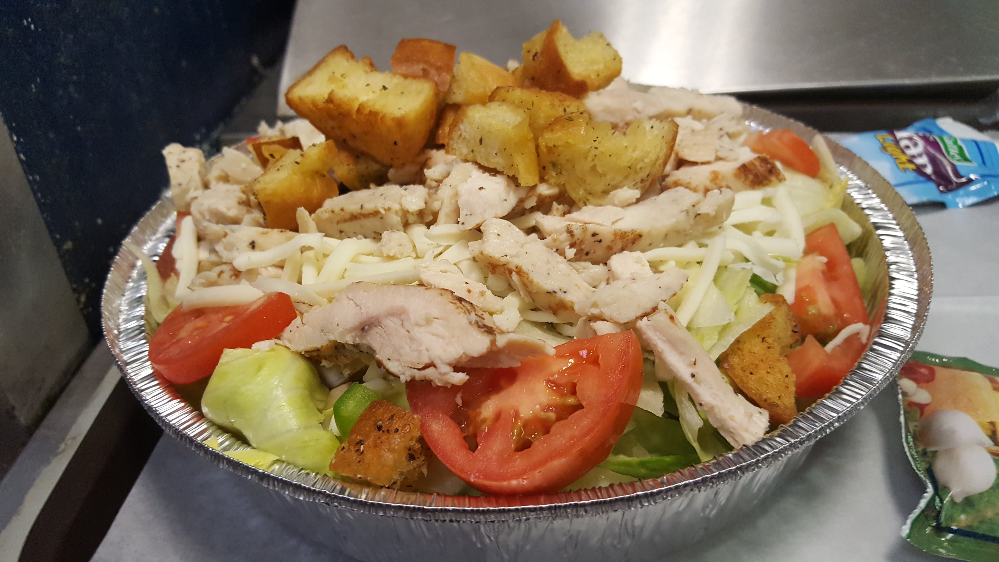Order Grilled Chicken Salad food online from Gumby's Pizza store, Iowa City on bringmethat.com