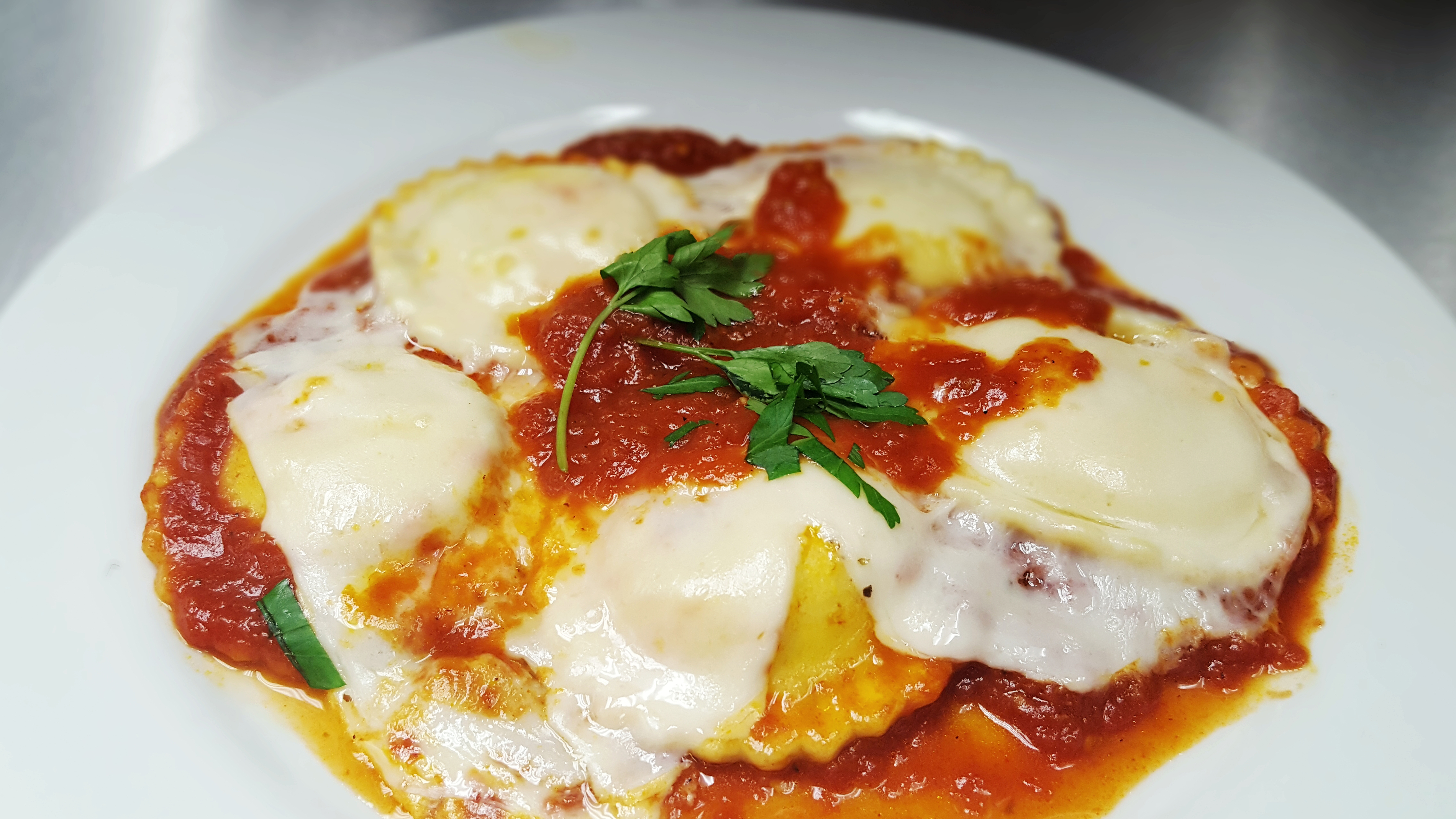 Order Cheese Ravioli food online from Pizza Center store, Middlesex on bringmethat.com
