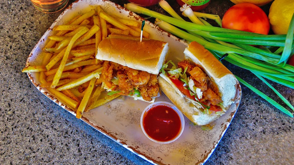 Order Shrimp Po’ Boy food online from Voodoo Daddy Steam Kitchen store, Tempe on bringmethat.com