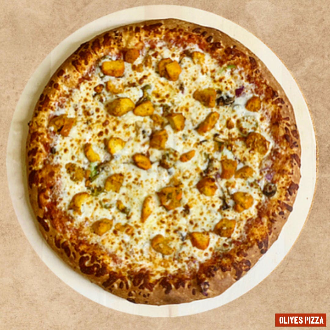 Order The Butter Chicken Pizza - Large 14'' (8 Slices) food online from Olives Pizza Inc. store, Stafford on bringmethat.com