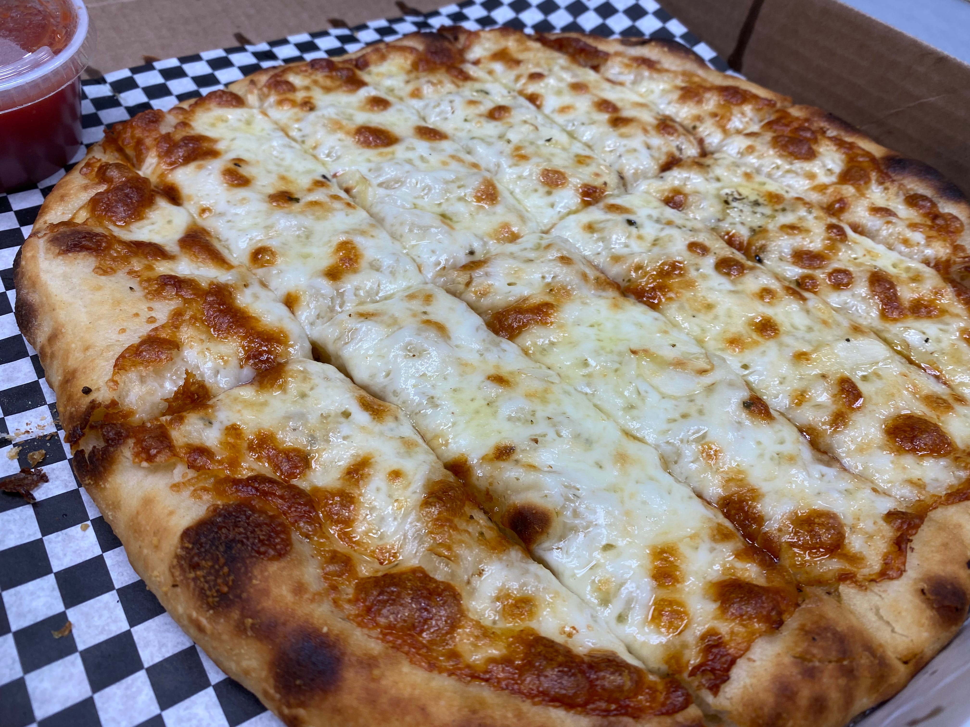 Order Garlic Cheese Bread - Side food online from Reel Pizza Pies store, Surprise on bringmethat.com