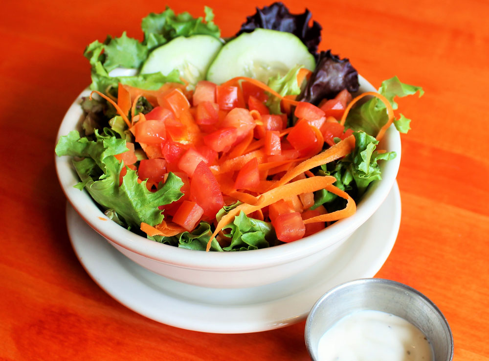 Order Garden Salad food online from The Roman Candle Pizzeria store, Middleton on bringmethat.com