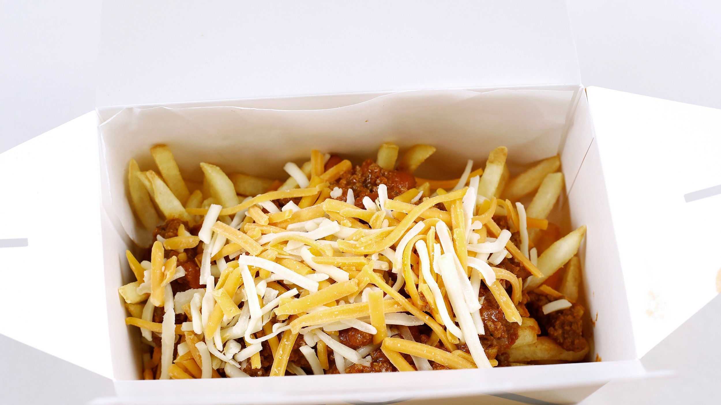 Order Chili Cheese Fries food online from Holy Cluck store, Chicago on bringmethat.com