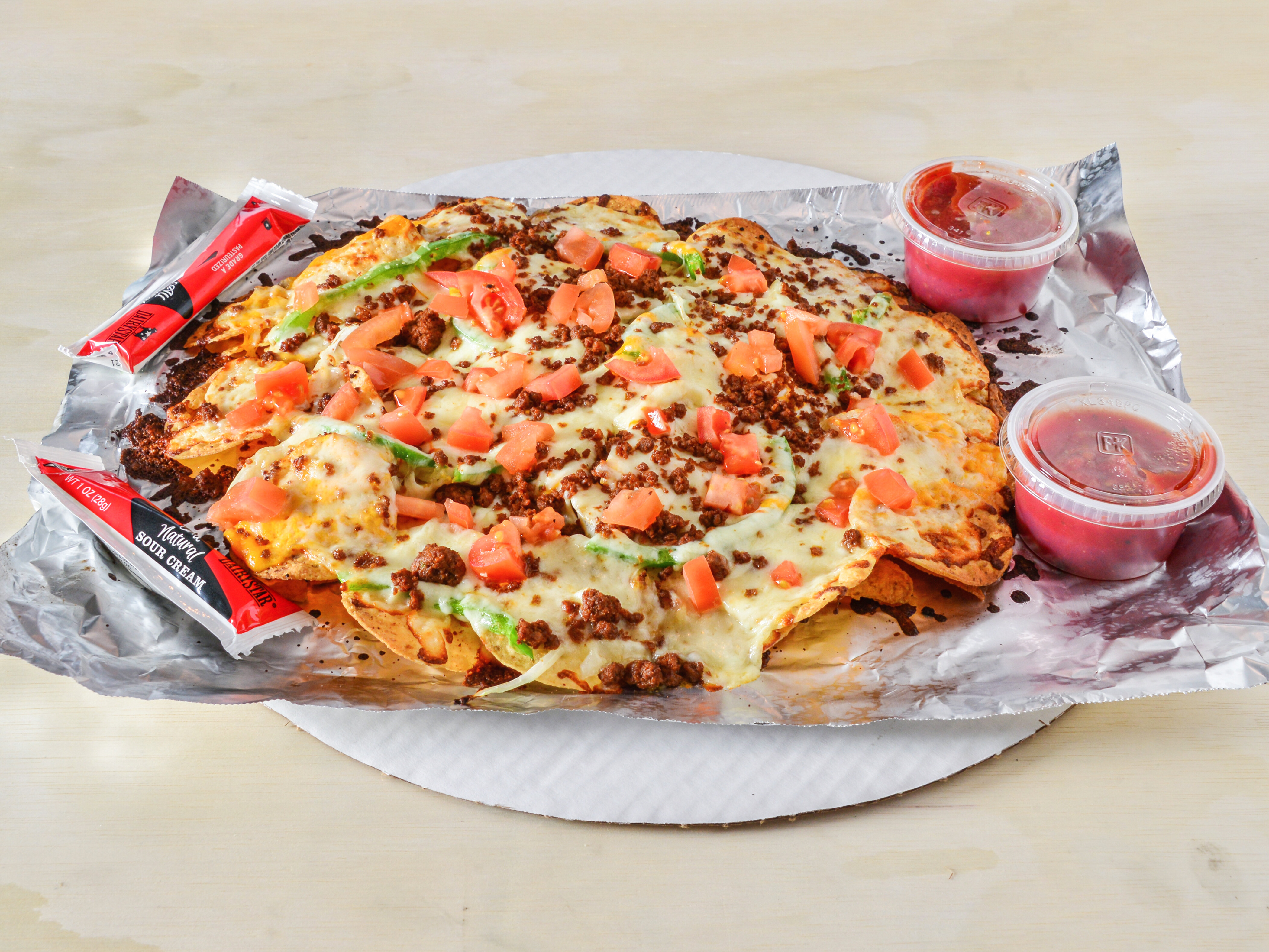 Order Deluxe Nachos food online from Cavoni Pizza & Grinders store, Battle Creek on bringmethat.com