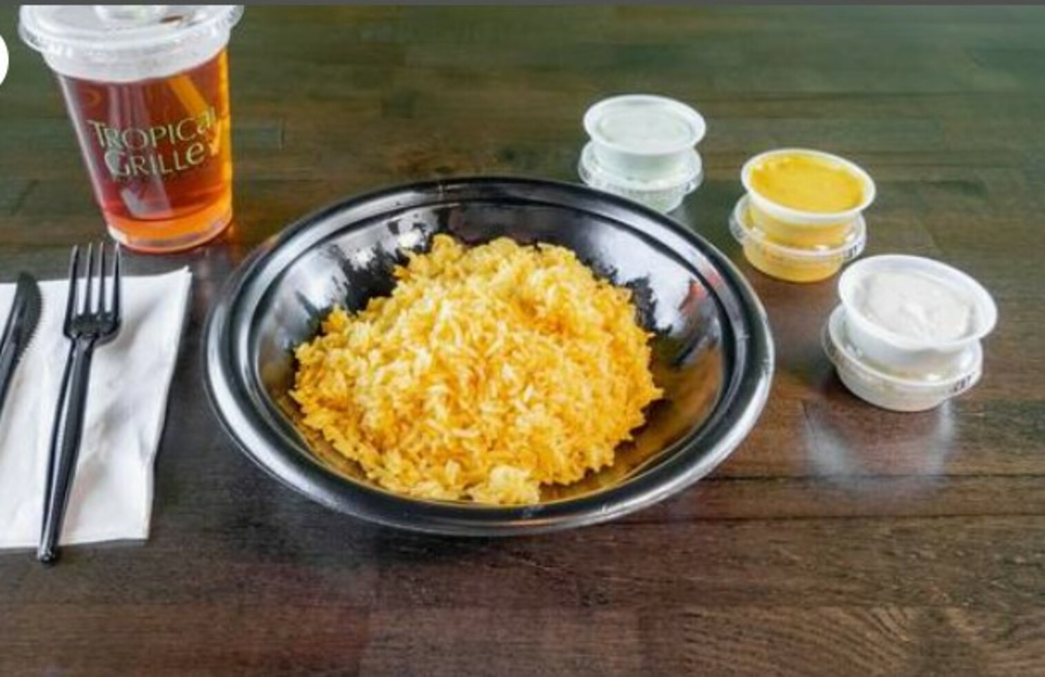 Order Yellow Rice food online from Tropical Grille store, Lexington on bringmethat.com