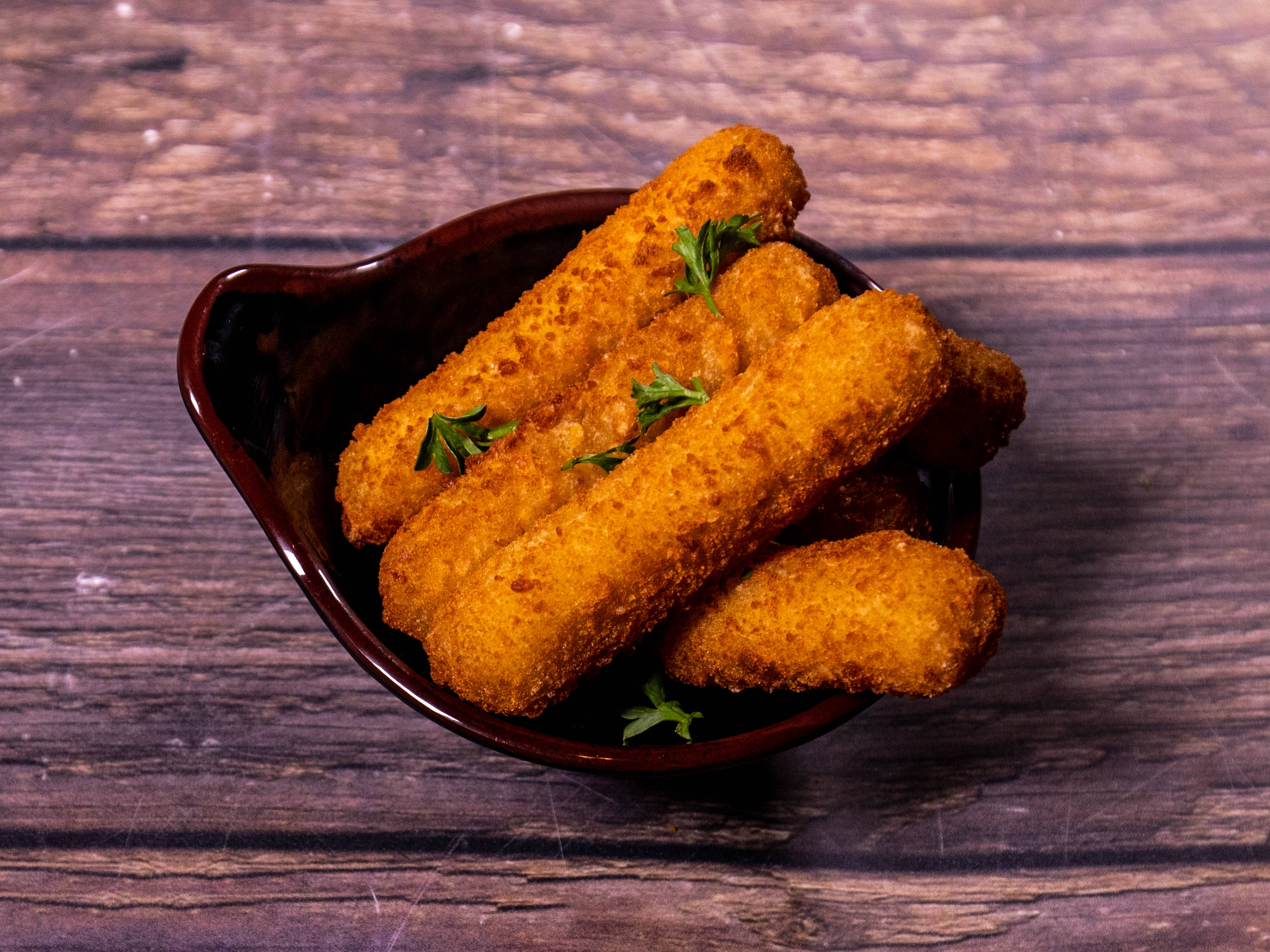 Order 6 Piece Fried Mozzarella Sticks food online from Flamin' Stone store, Spring on bringmethat.com