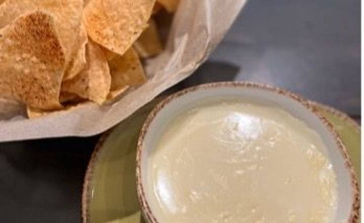 Order Chips & Queso food online from Tio Taco+Tequila store, Marlboro on bringmethat.com
