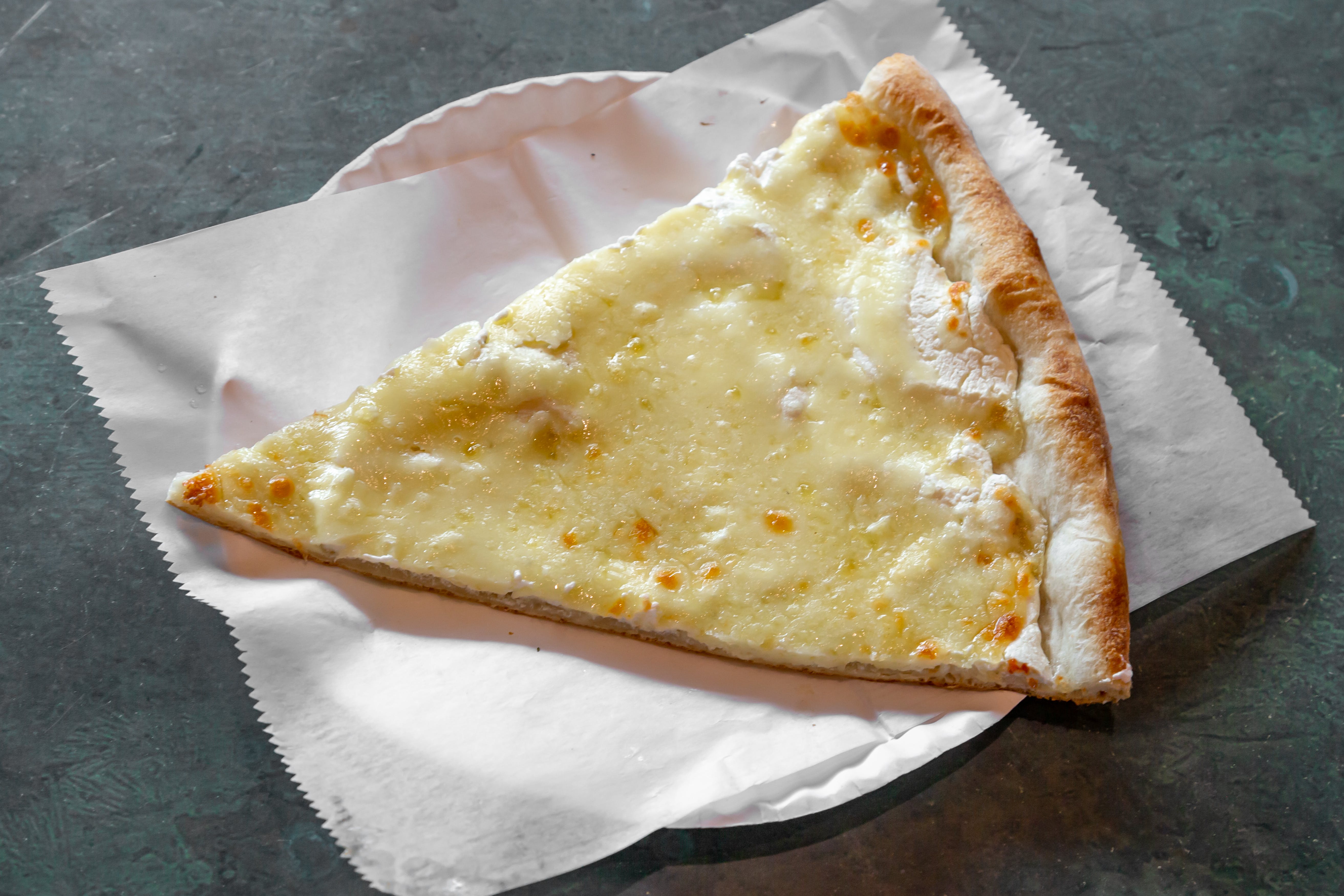 Order White Pizza - 16" food online from Tony's Pizza store, Medford on bringmethat.com