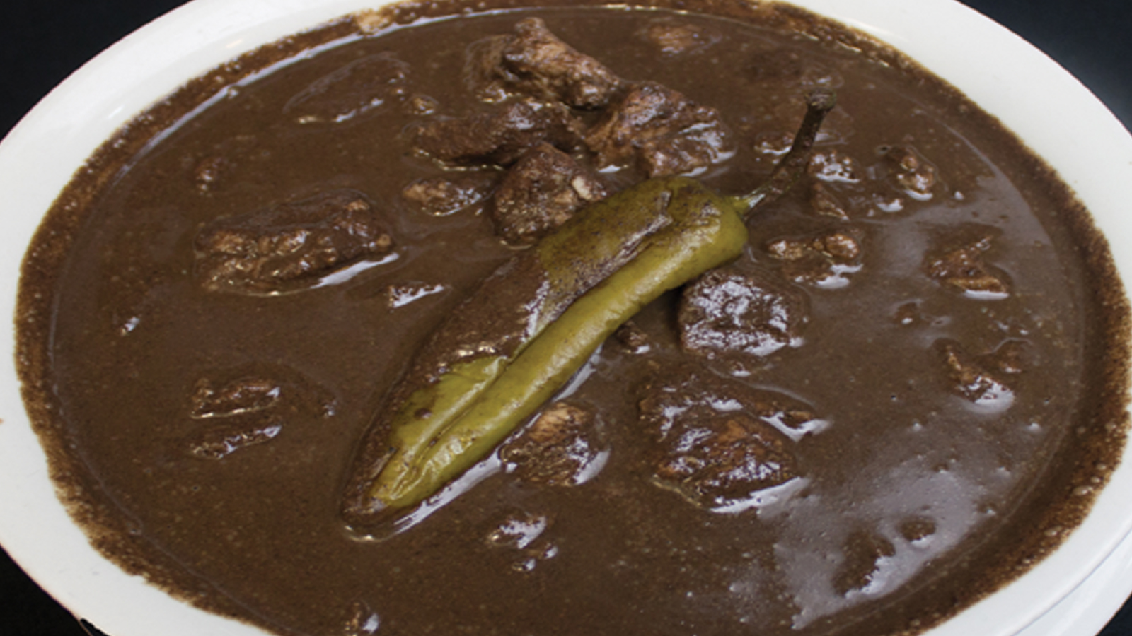 Order Dinuguan food online from Bamboo Bistro store, Los Angeles on bringmethat.com