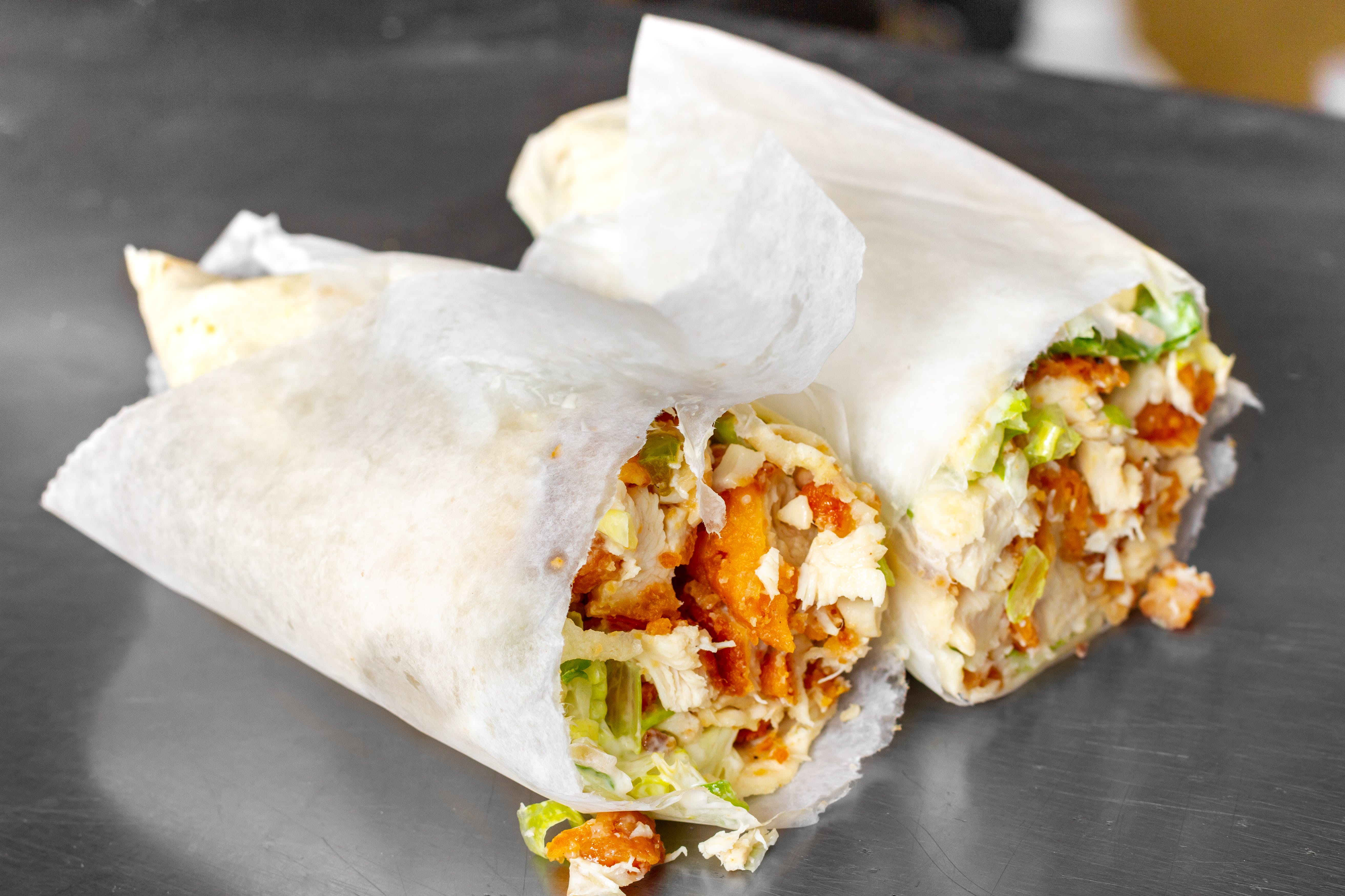 Order Buffalo Chicken Wrap - Wrap food online from The Royal Pizza store, Baltimore on bringmethat.com
