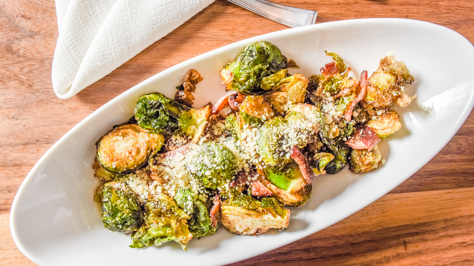 Order Bacon and Parmesan Brussels Sprouts (GF) food online from Gluten Free Colorado Bistro store, Golden on bringmethat.com