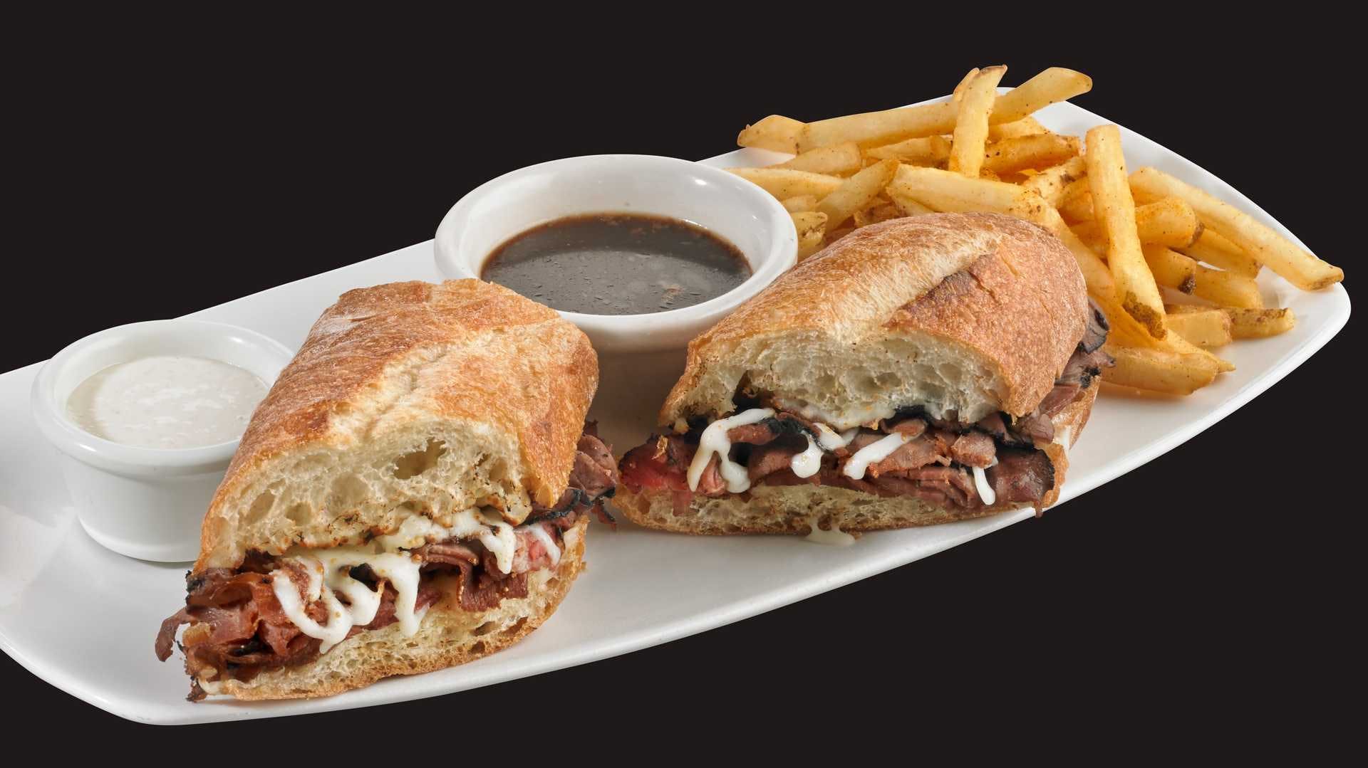 Order French Dip Sandwich - Sandwiches food online from Boston Restaurant & Sports Bar store, Citrus Heights on bringmethat.com