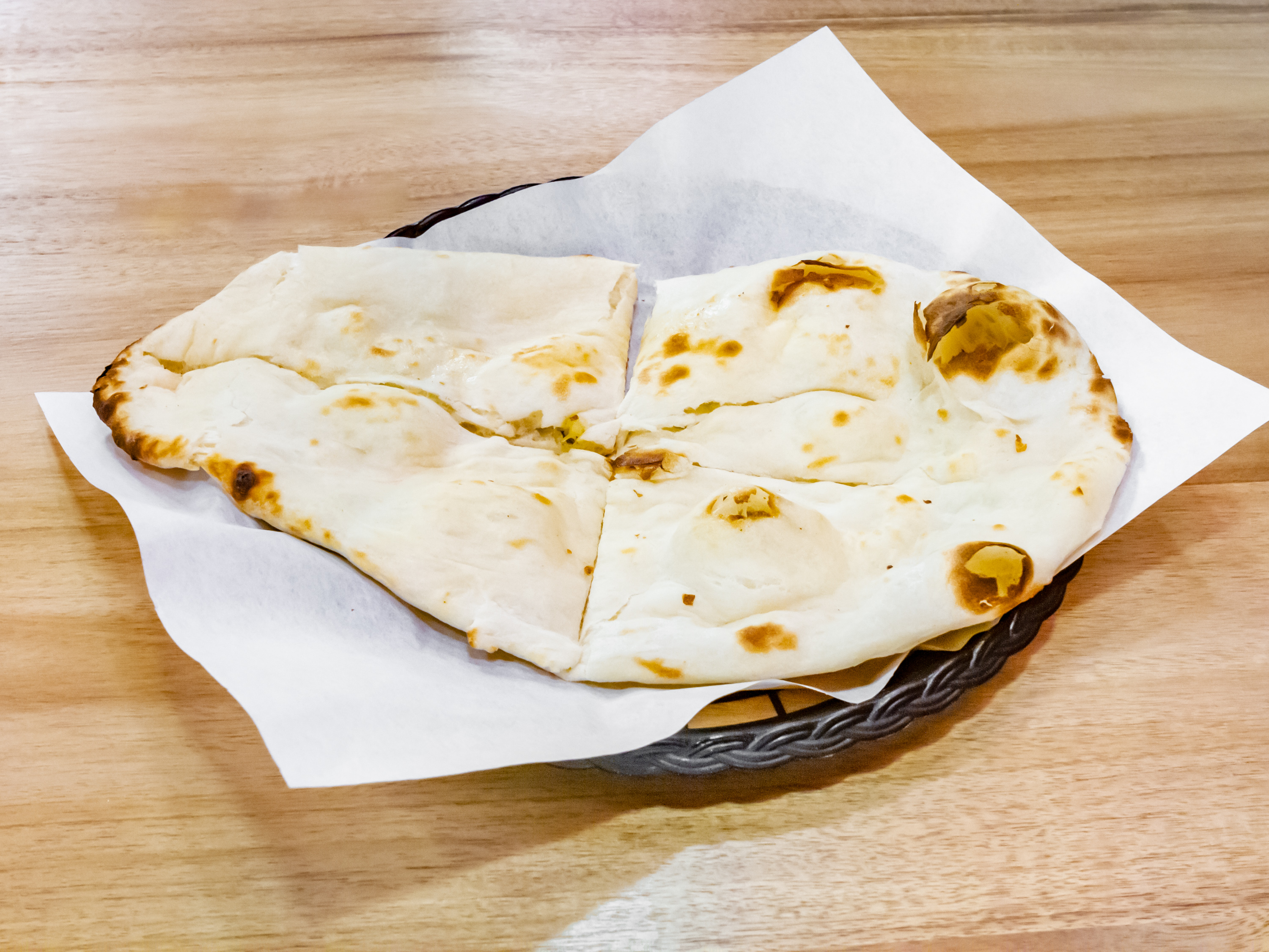 Order Naan food online from India House Authentic Cuisine store, Post Falls on bringmethat.com