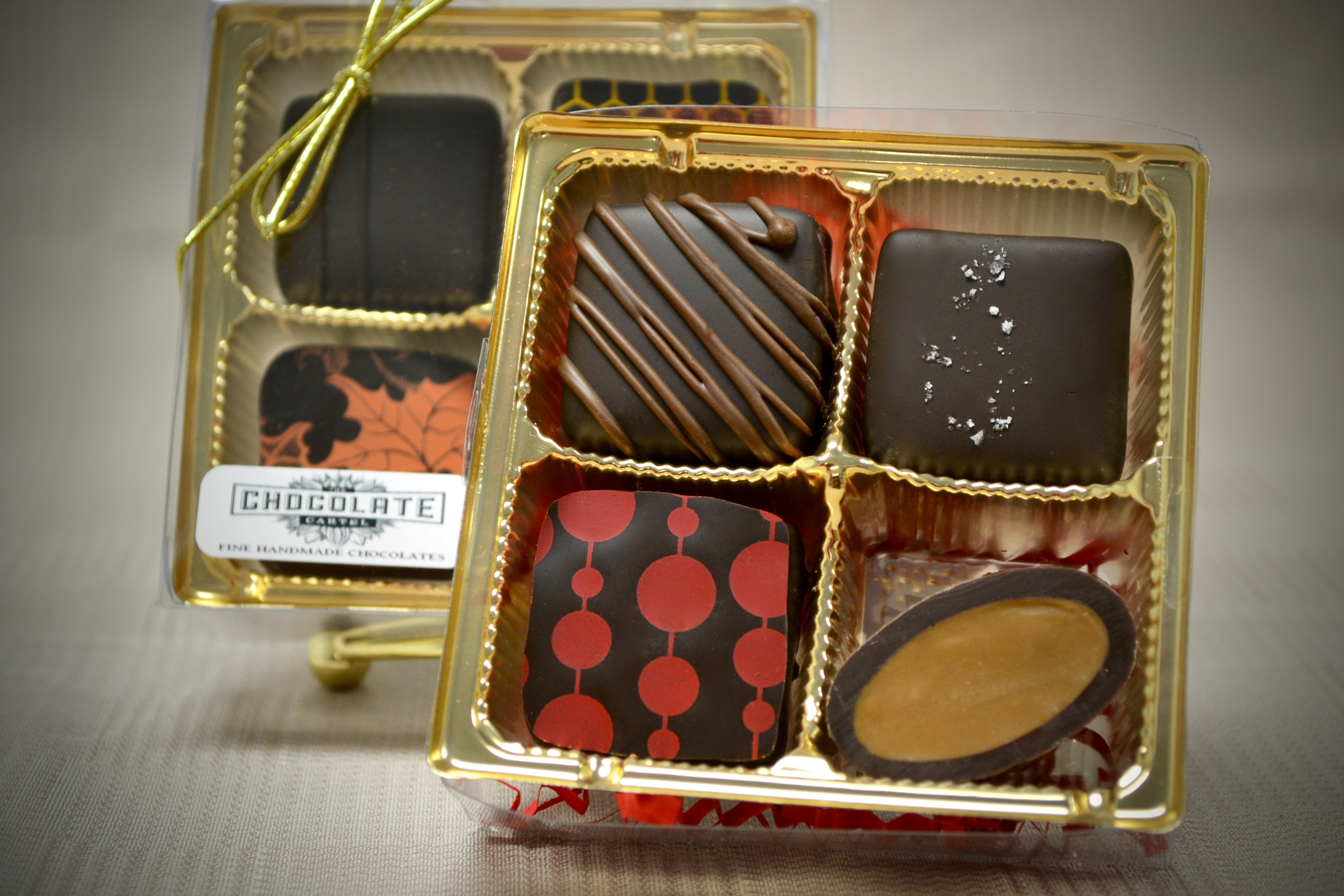 Order 4 Piece Box food online from Chocolate Cartel store, Albuquerque on bringmethat.com