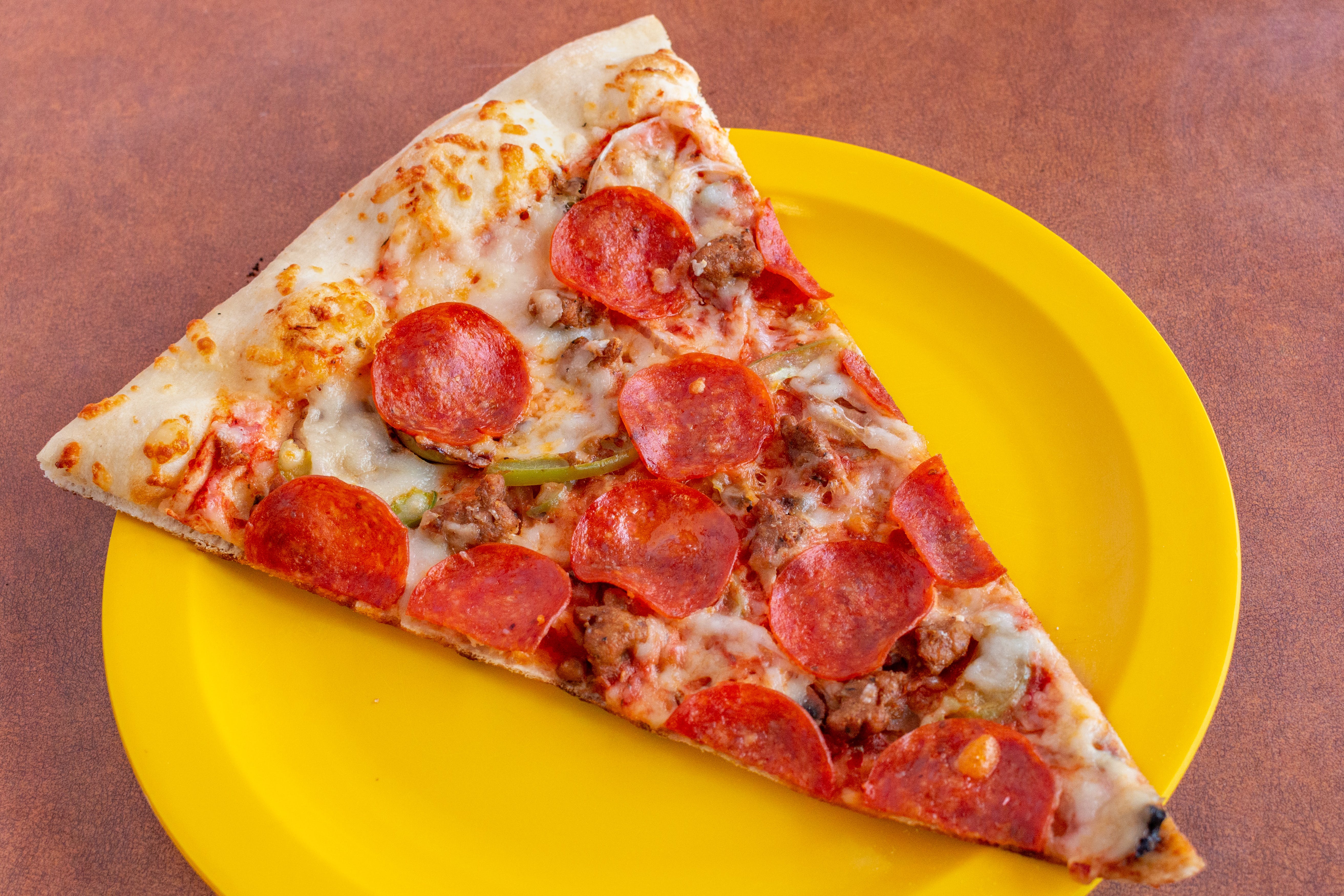 Order Combo Pizza - 12'' (8 Slices) food online from Famous Pizza store, Denver on bringmethat.com