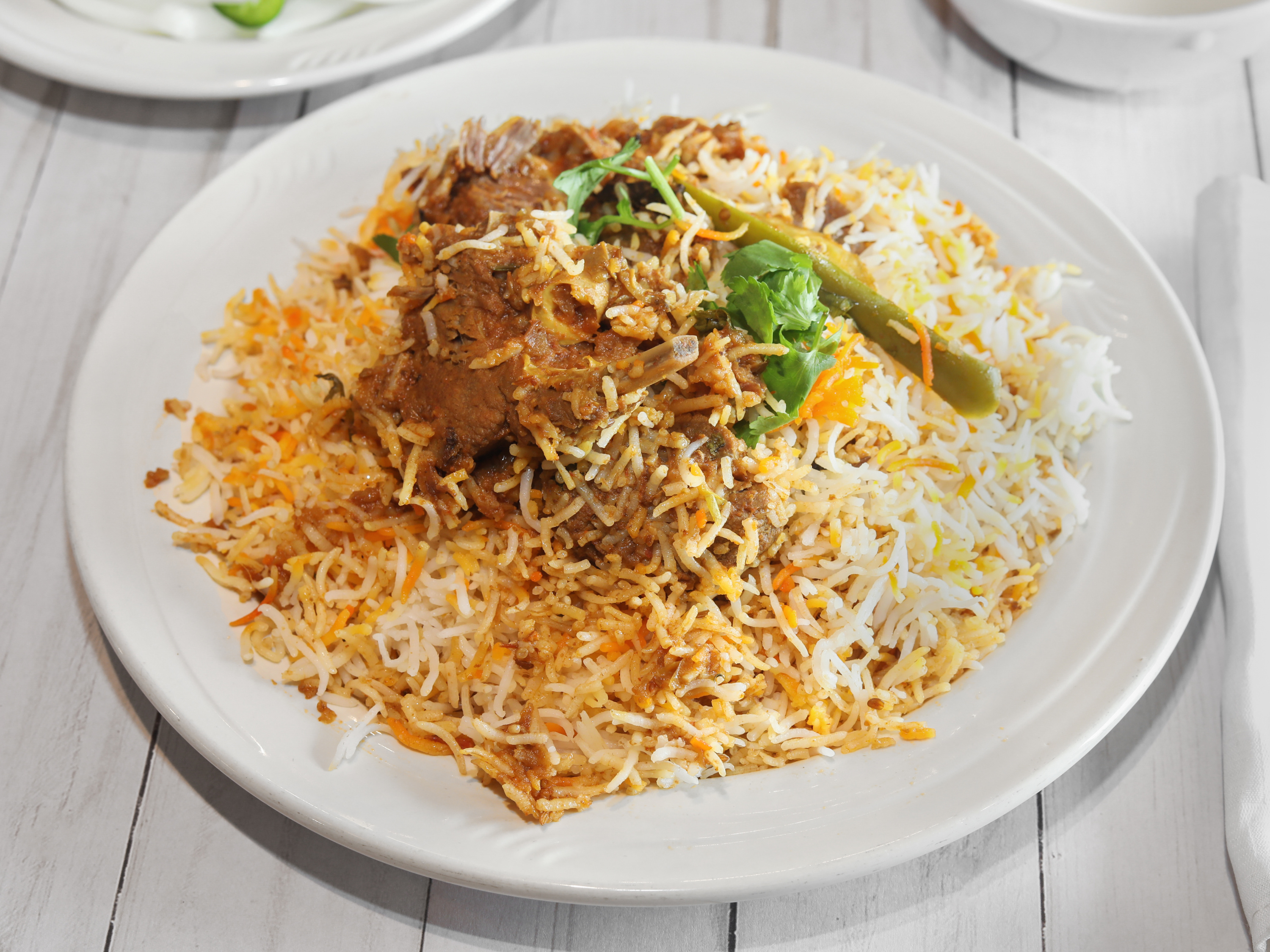 Order Goat Biryani food online from The Mughals store, Norcross on bringmethat.com