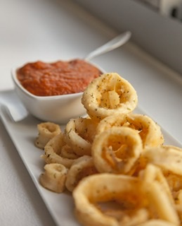Order Fried Calamari Rings food online from New York Pizza & Family Restaurant store, Tannersville on bringmethat.com