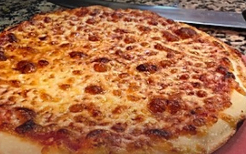 Order Plain Cheese Pizza - 10'' (Serves 2) food online from Singas famous pizza store, Kew Gardens on bringmethat.com