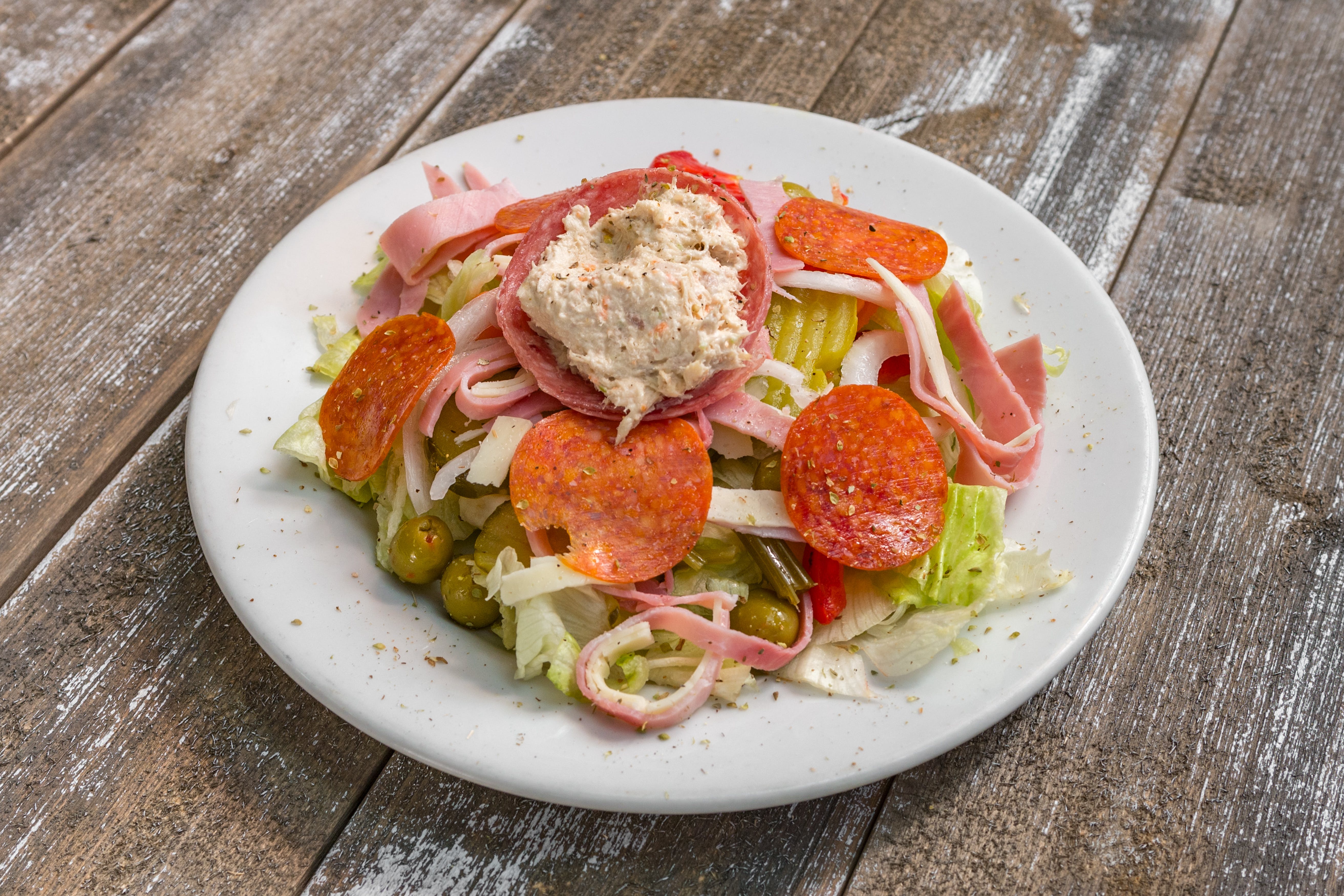 Order Antipasto Salad - Salad food online from Two Cousin Pizza store, Lancaster on bringmethat.com