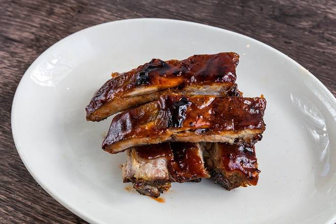 Order All-American Baby Back Ribs - 5 bones food online from Wood Ranch BBQ & Grill store, Camarillo on bringmethat.com