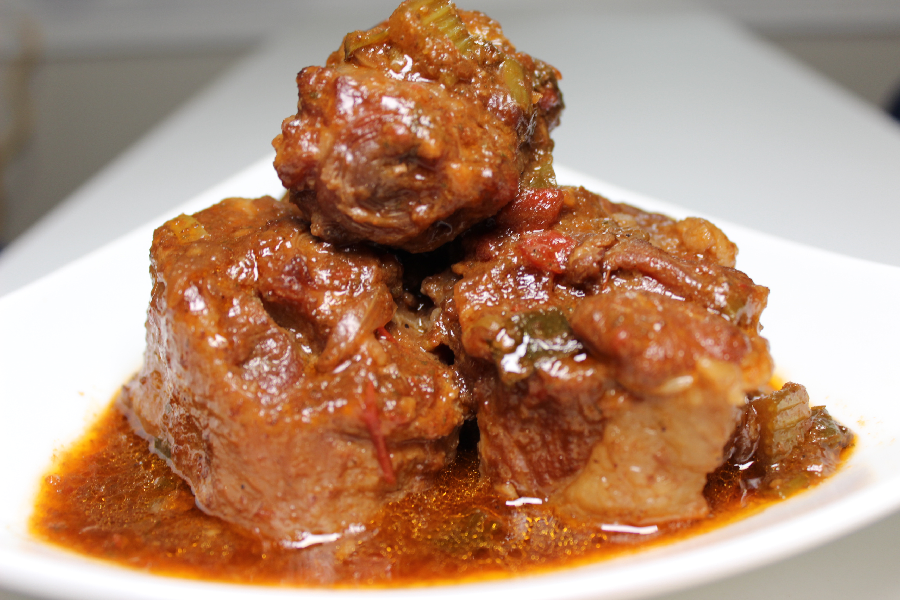 Order Goat Stew food online from Okapi Bistro store, Bloomingdale on bringmethat.com