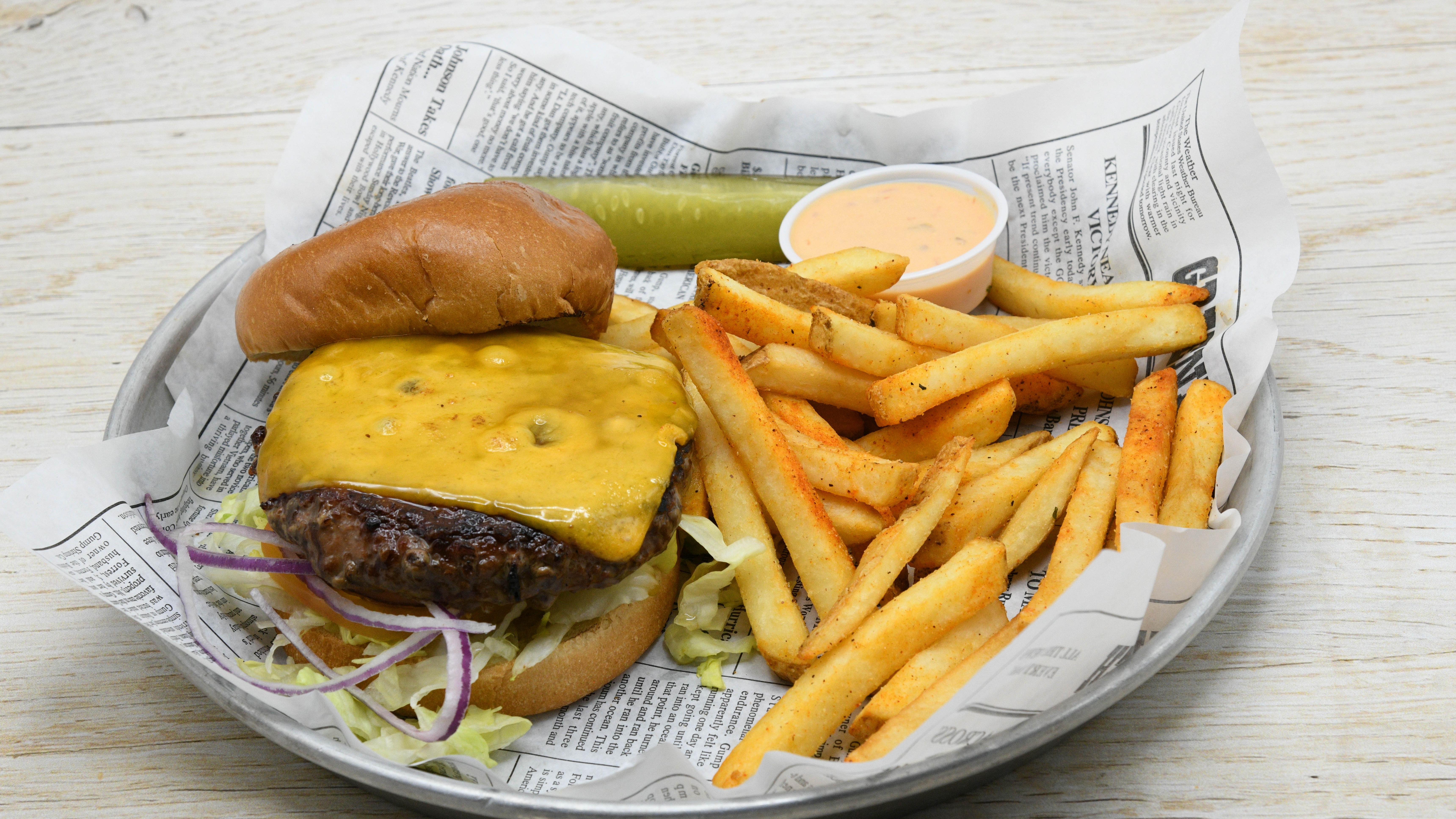 Order 1/2 lb. All-American Cheeseburger food online from Bubba Gump Shrimp store, Gatlinburg on bringmethat.com