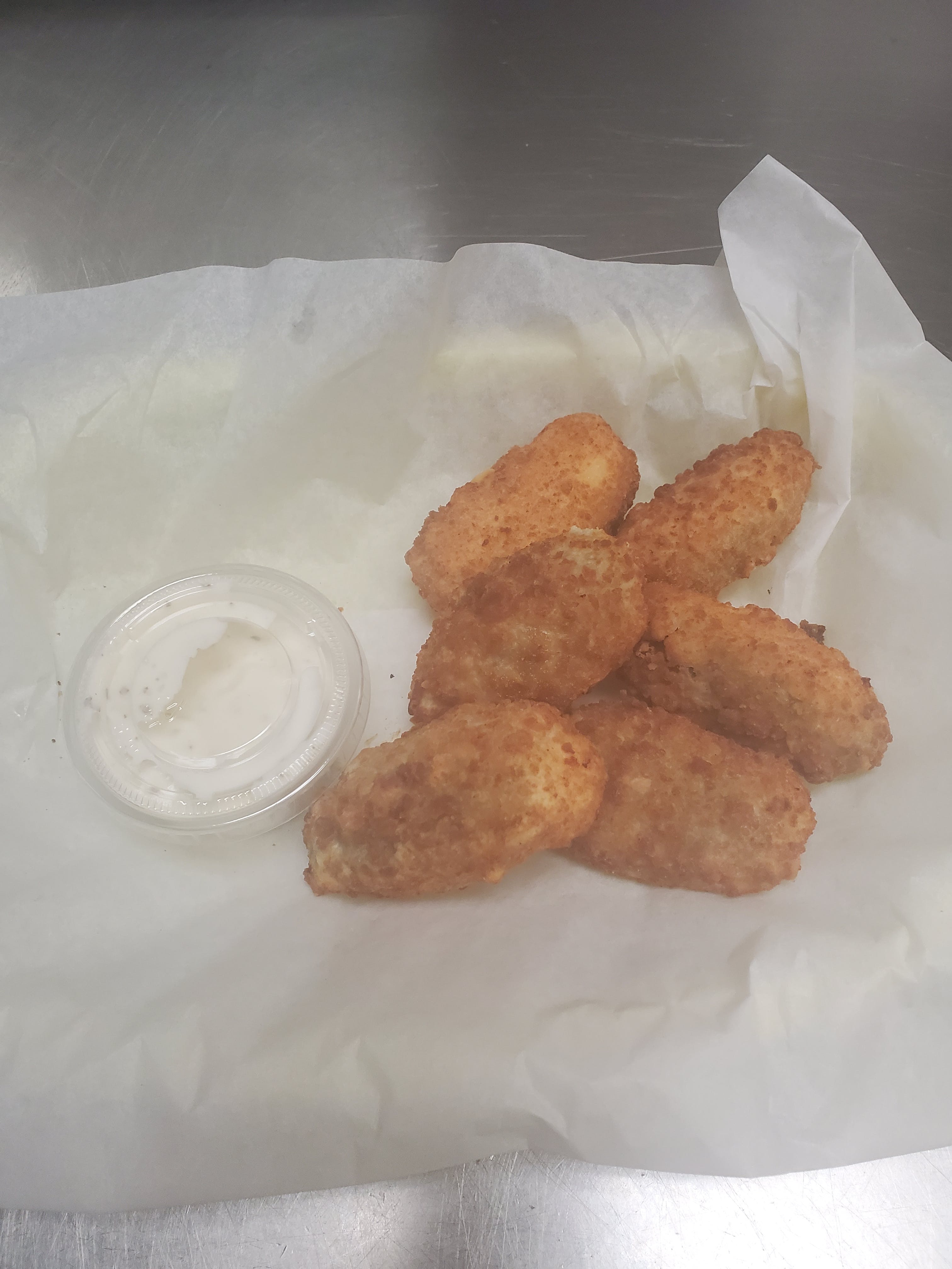 Order Cream Jalapeno Poppers - Appetizer food online from Pizza Cucina store, Oswego on bringmethat.com