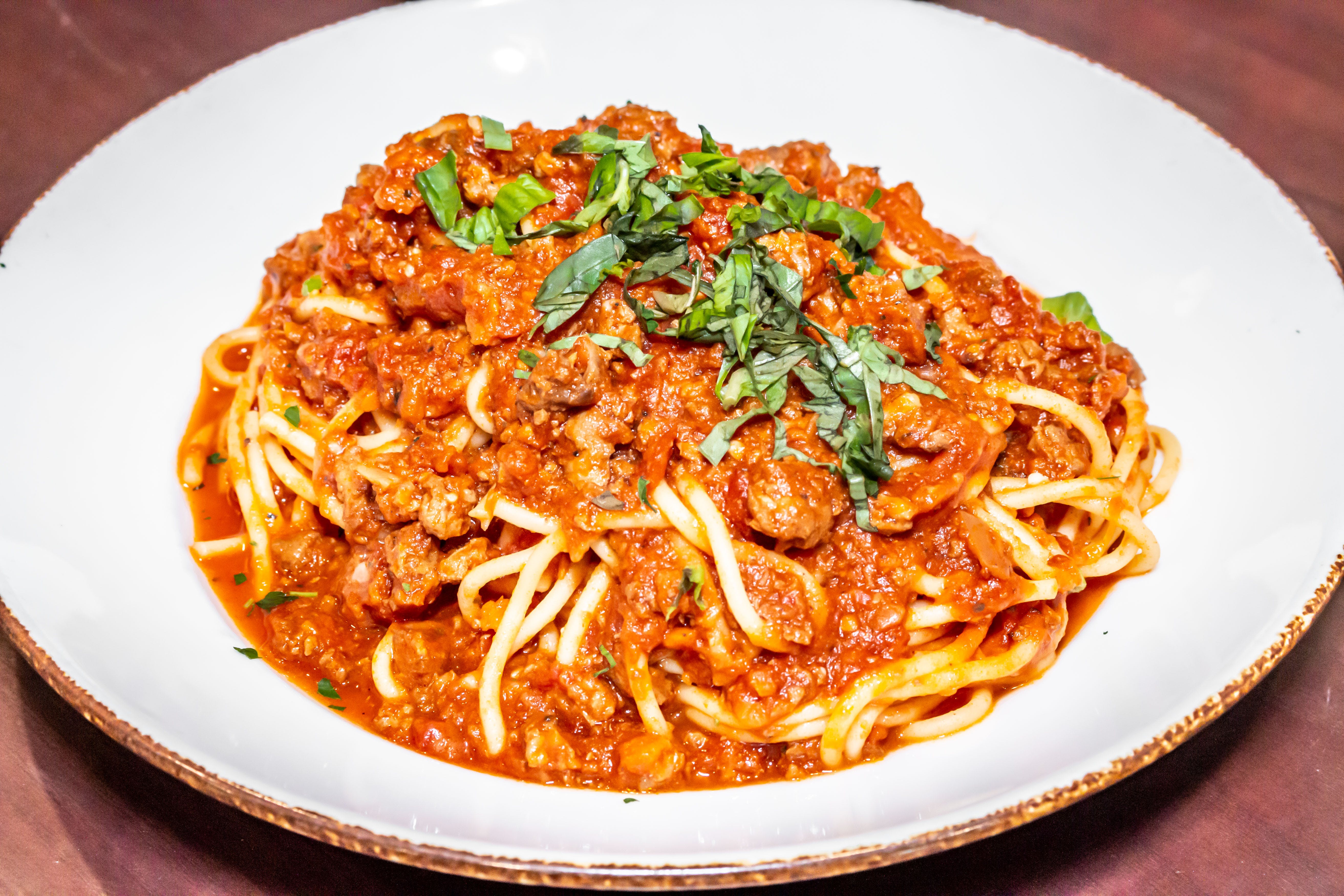 Order Pasta with Bolognese Sauce - Pasta food online from Mamma Maria's Pizzeria and Ristorantes store, Bensenville on bringmethat.com