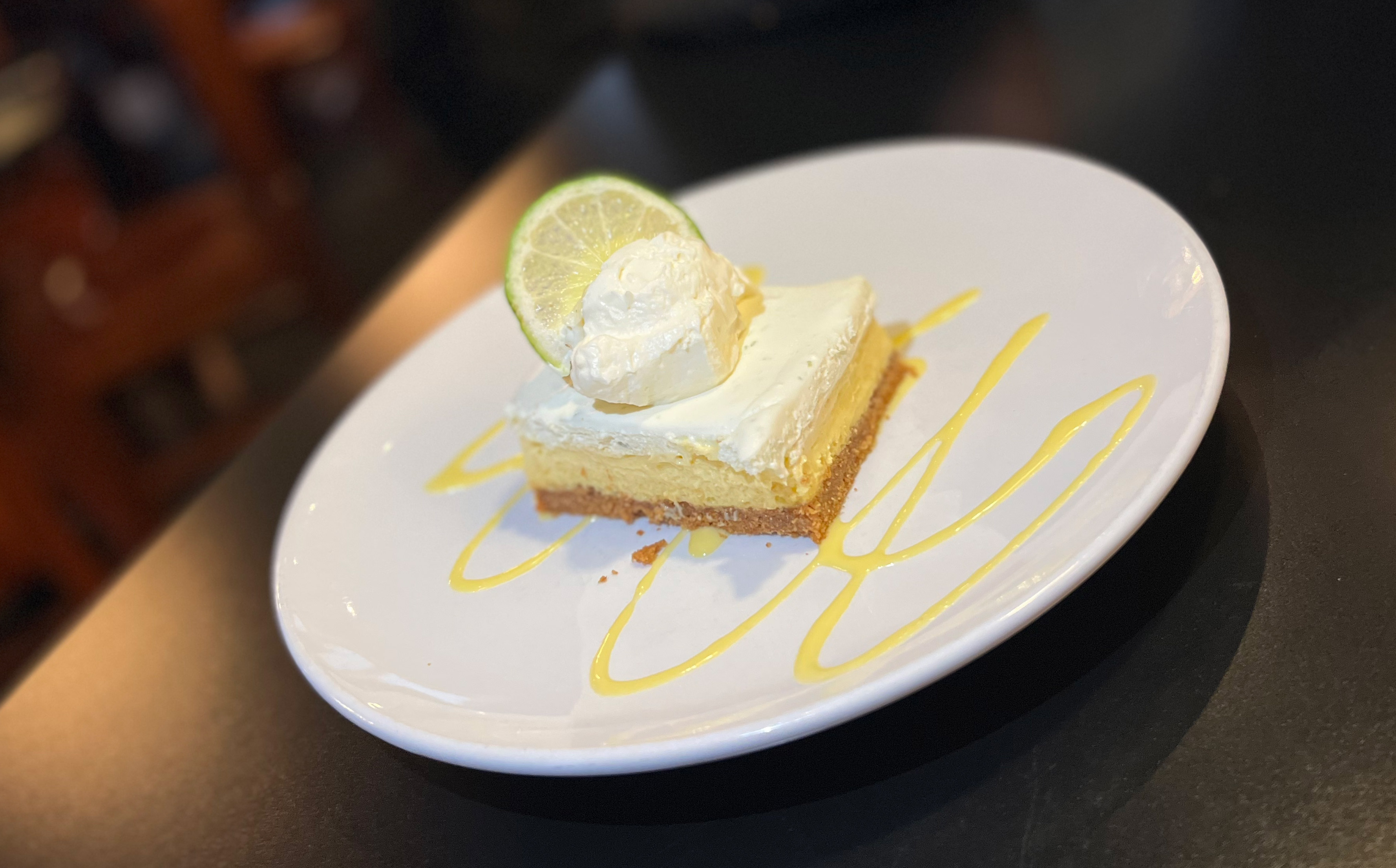 Order Key Lime Pie food online from Taxi Grille & Bar store, Omaha on bringmethat.com