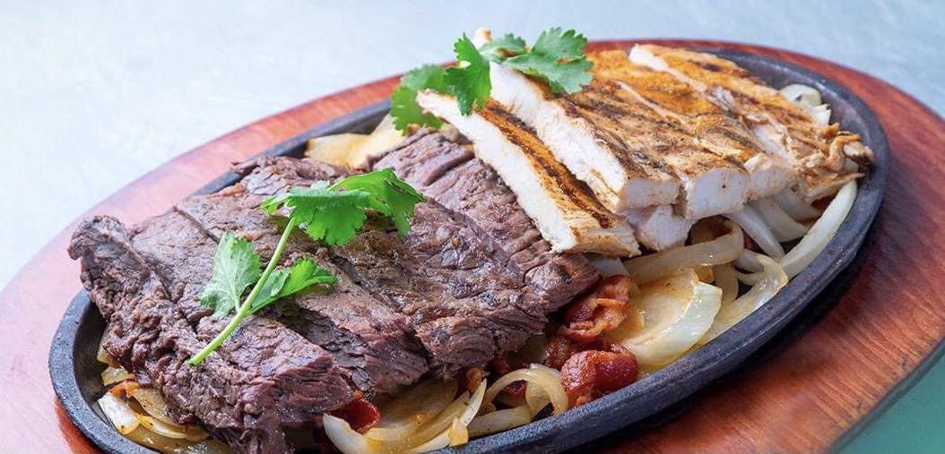 Order Beef and Chicken Fajitas food online from Mezcal Cantina Mexican Kitchen store, Shenandoah on bringmethat.com
