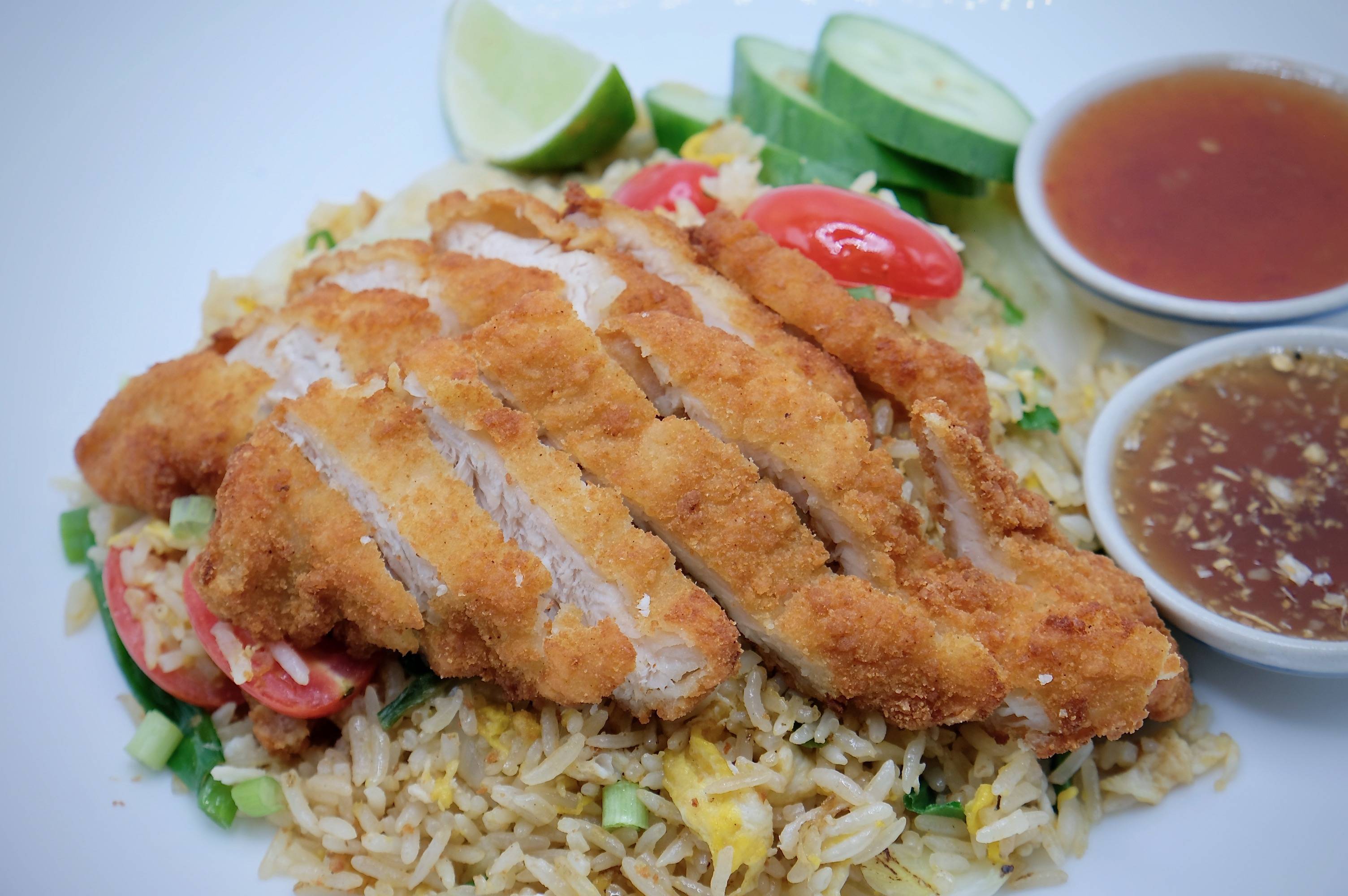 Order Pine Apple Fried Rice with special sauce of Chicken Wings/Tenders food online from Pro thai store, New York on bringmethat.com