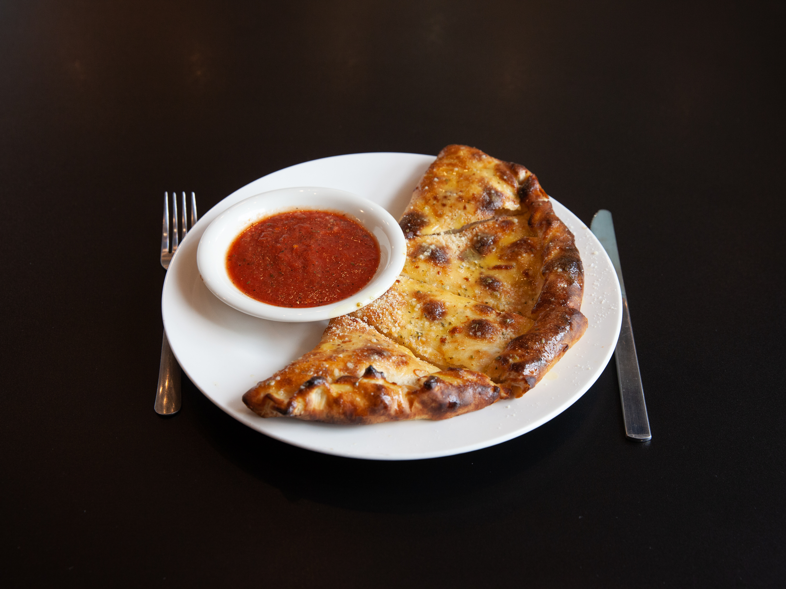 Order Calzone 10" food online from Sicilia Pizza Kitchen store, Salt Lake City on bringmethat.com