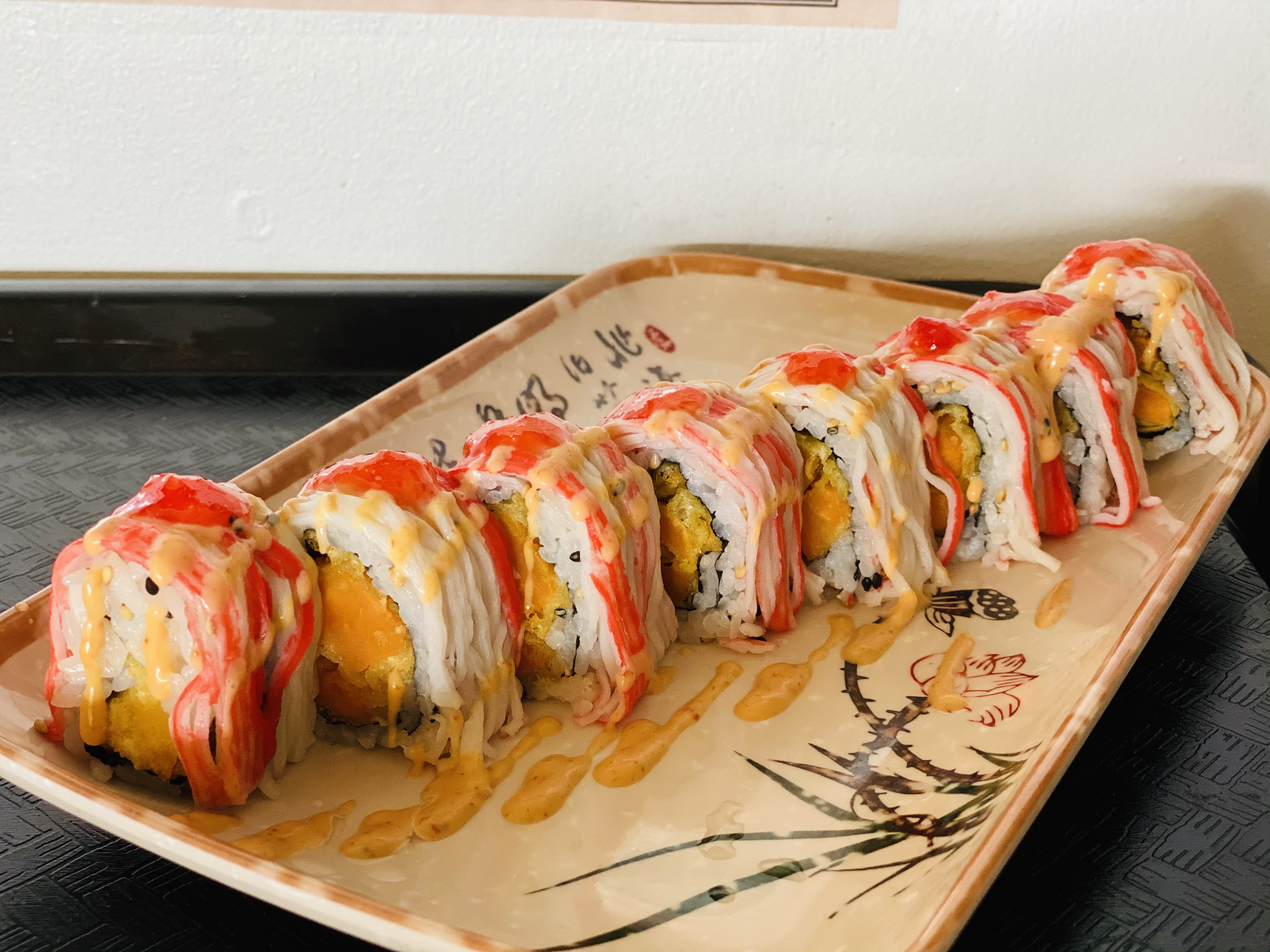 Order Spicy Salmon Roll + Sakura Roll food online from Tengu Sushi store, Newport on bringmethat.com