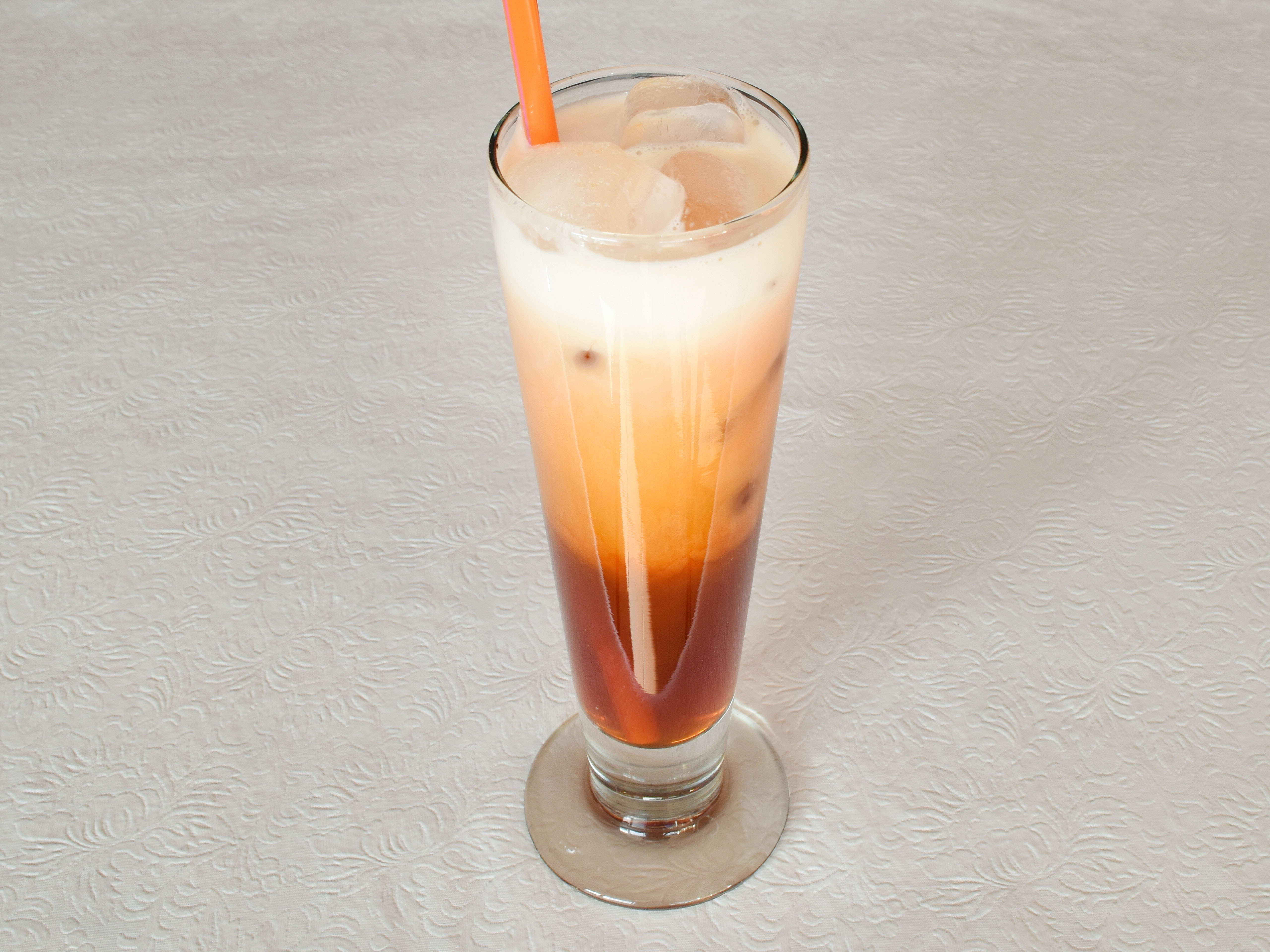 Order 1. Thai Iced Tea food online from Jewel of Siam Restaurant store, Orland Park on bringmethat.com