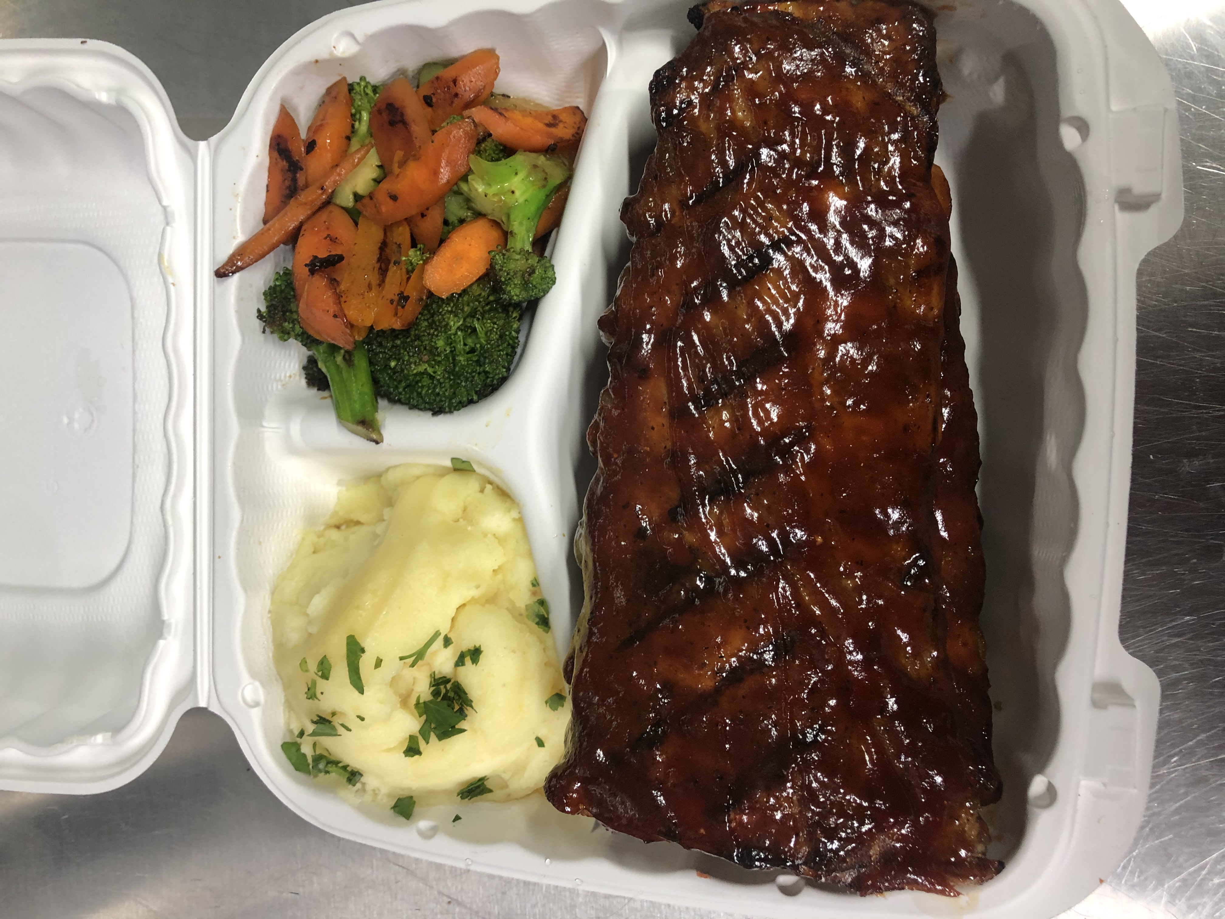 Order Hickory Smoked BBQ Baby Back Ribs food online from D&D Shack store, Melrose Park on bringmethat.com