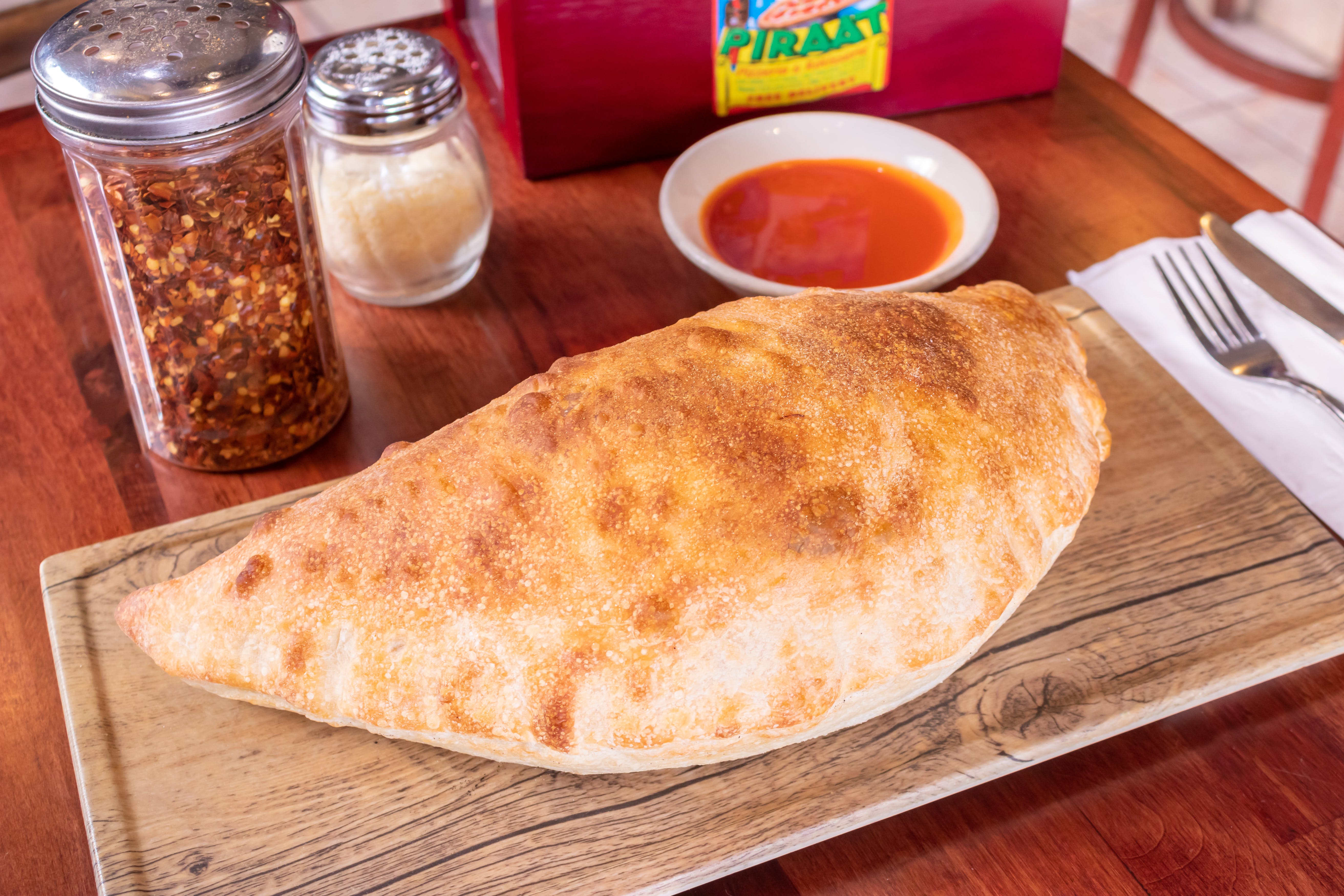 Order Cheese Calzone - Calzone food online from Piraat Pizzeria store, San Francisco on bringmethat.com