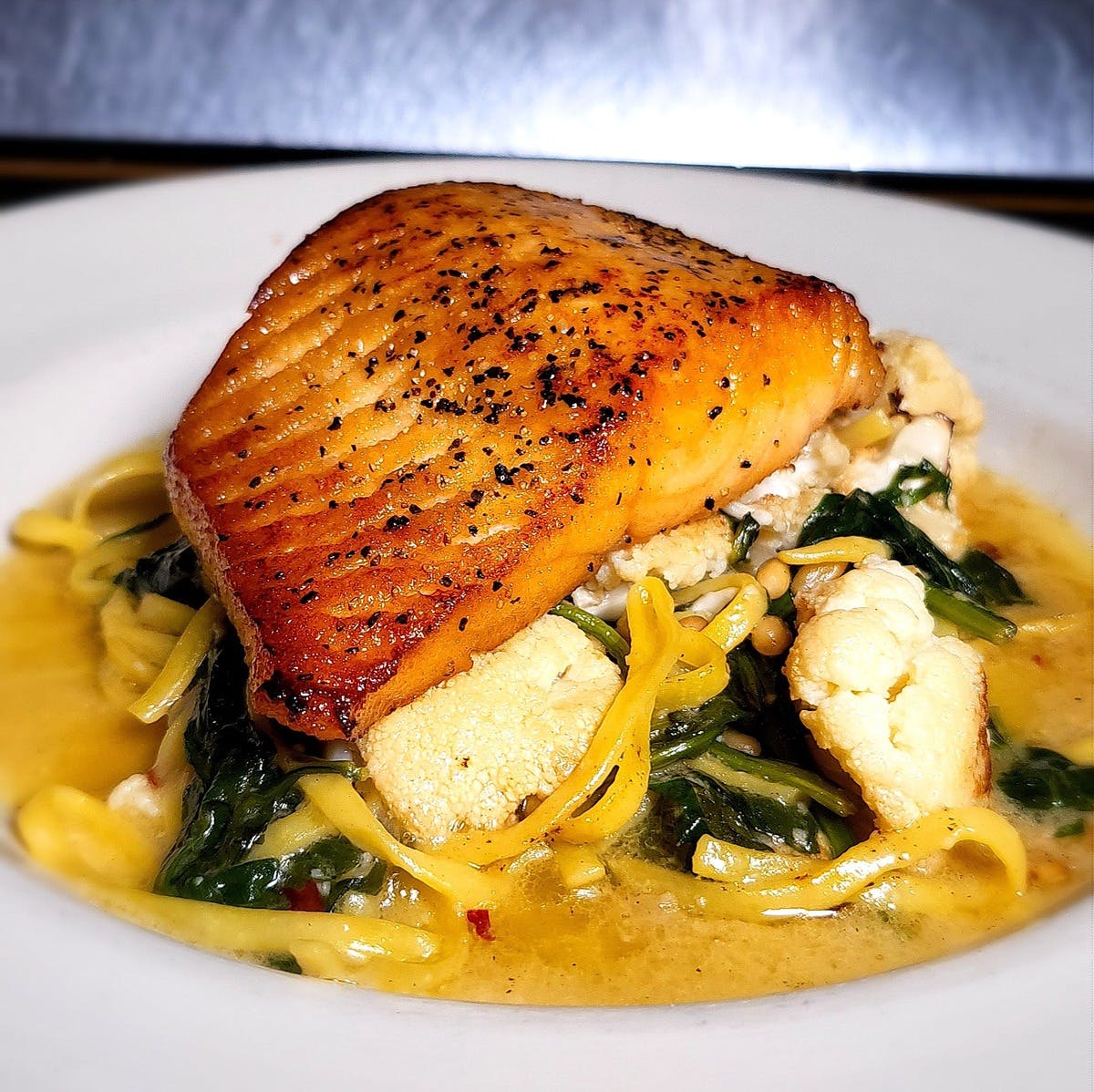 Order Oven Roasted Salmon Filet - Entree food online from Il forno classico store, Rancho Cordova on bringmethat.com