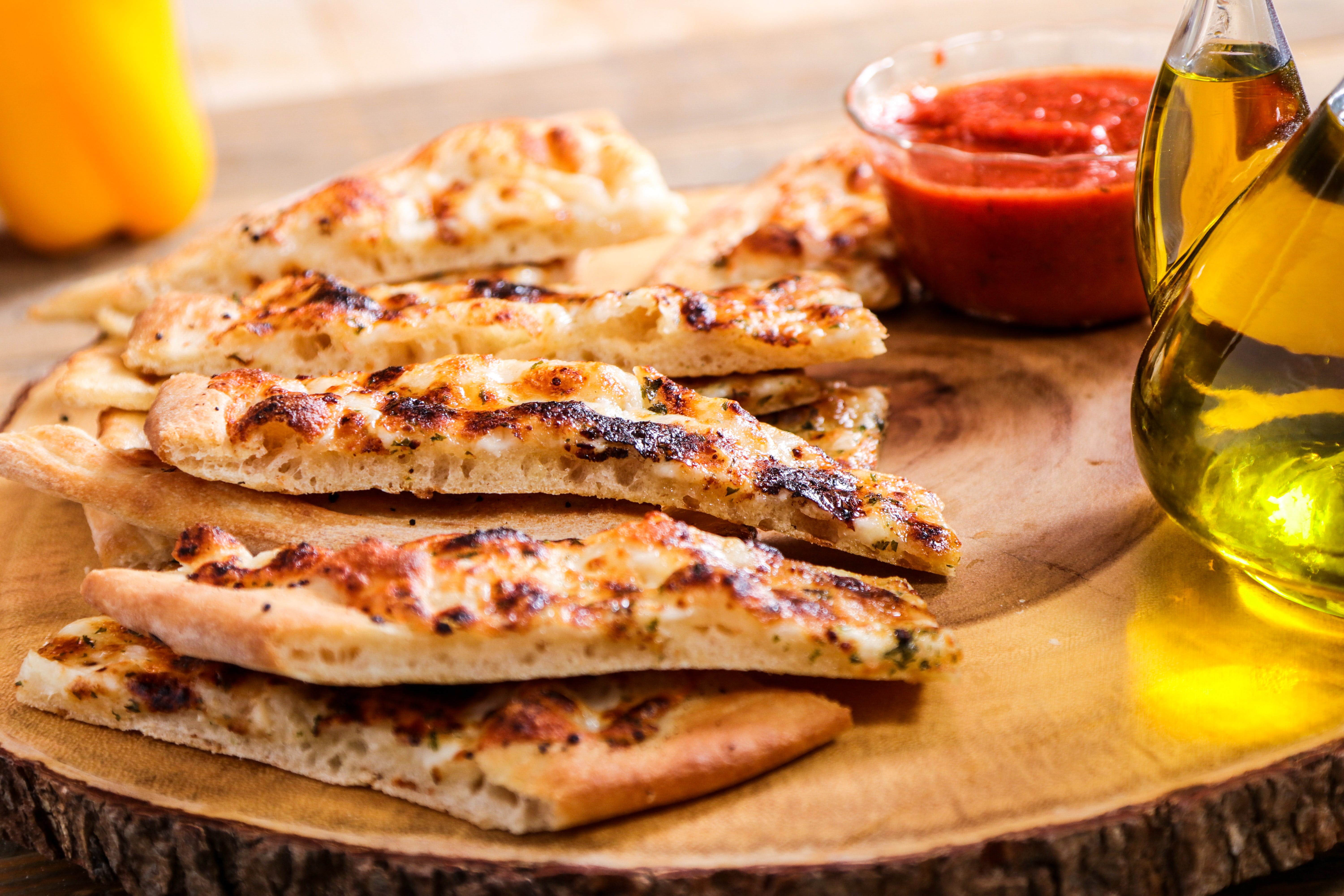 Order Garlic Cheese Breadsticks - Appetizer food online from Ameci Pizza & Pasta store, Canyon Country on bringmethat.com