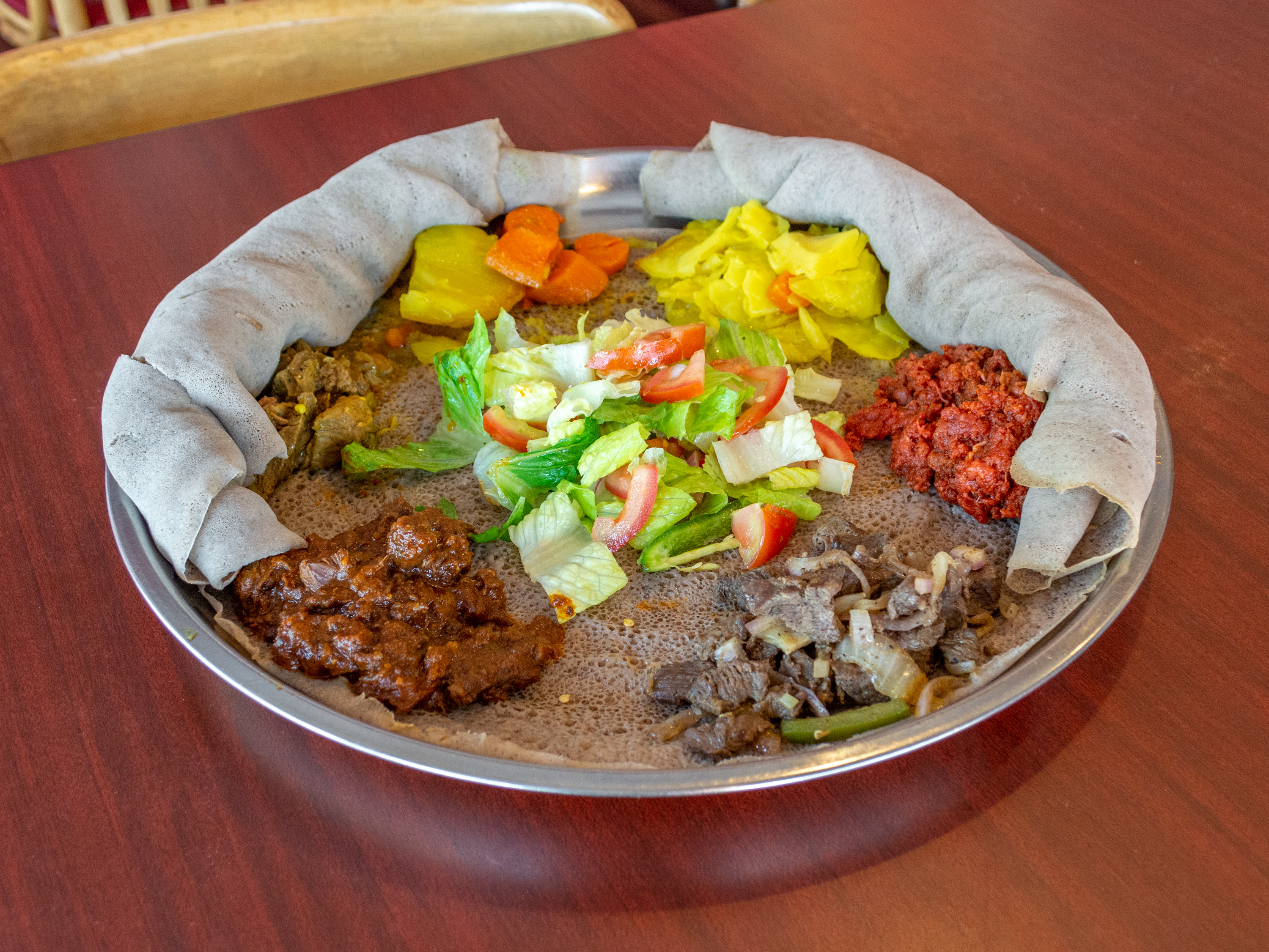 Order 13. Enat Combination food online from Enat Ethiopian Restaurant store, Seattle on bringmethat.com