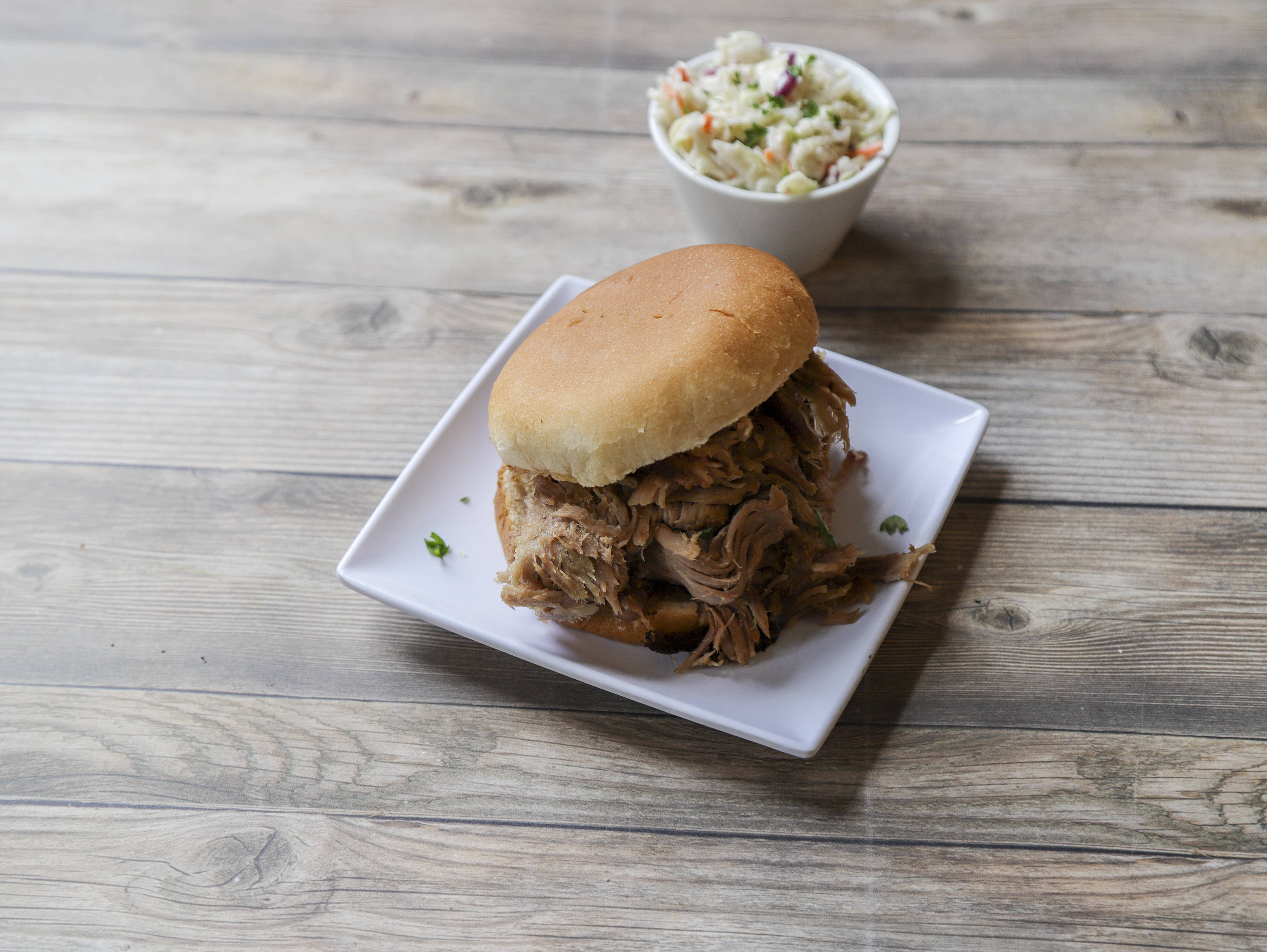 Order Pulled Pork Sandwich food online from Whole Hog Cafe & Catering Company store, Springfield on bringmethat.com