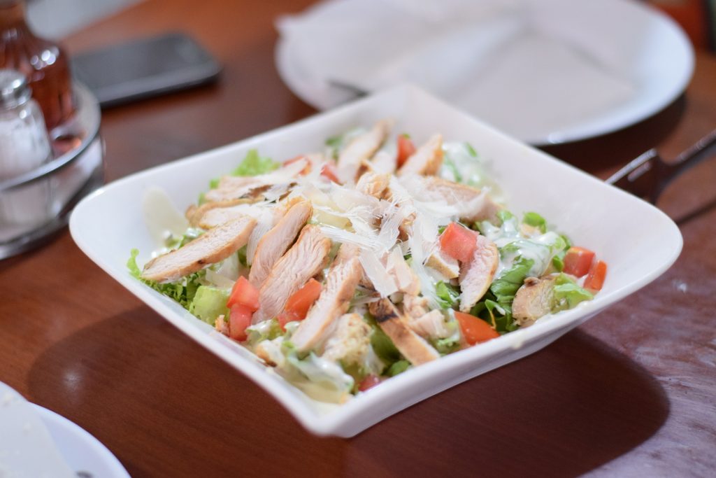 Order Chicken Caesar Salad food online from Paisano Of Surfside store, Myrtle Beach on bringmethat.com