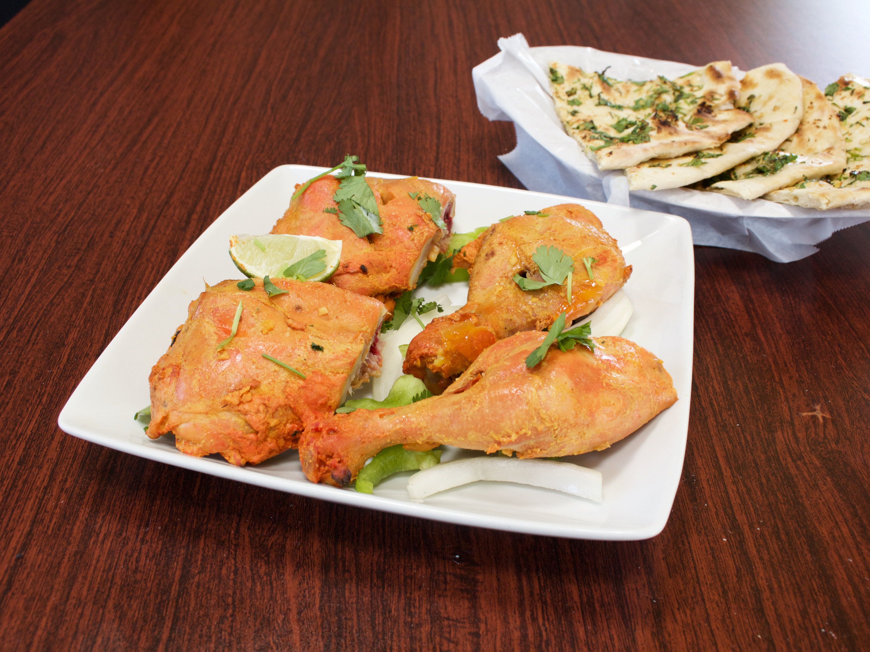 Order Tandoori Chicken food online from Mother India Cuisine store, Ceres on bringmethat.com