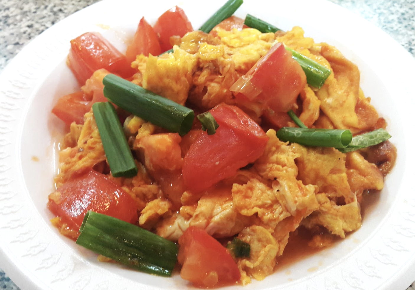 Order Tomato with Scrambled Eggs food online from Woodside Kitchen store, Elmhurst on bringmethat.com