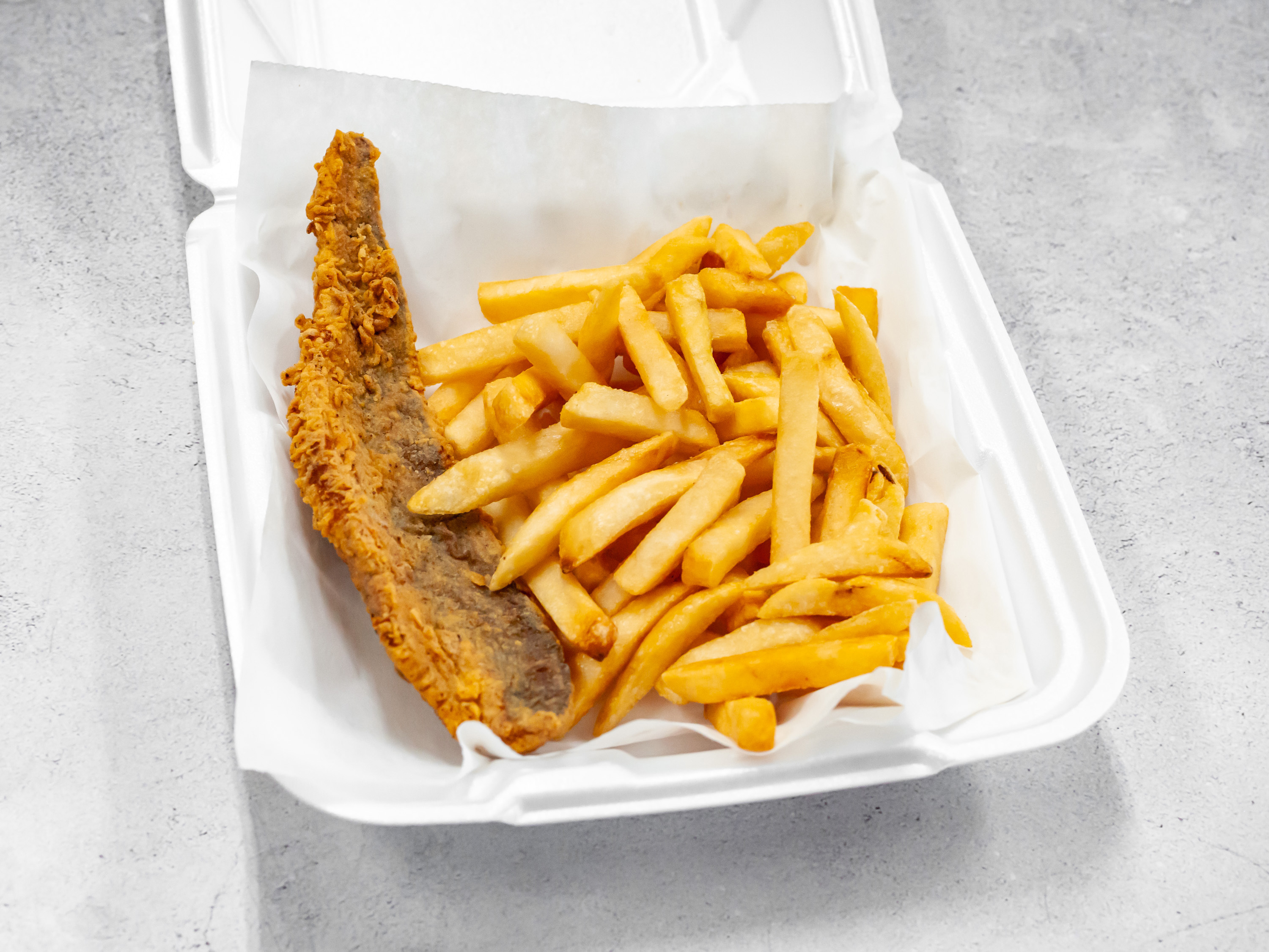 Order Fried Fish and Fries Combo food online from AHKIIS SOULFOOD store, Atlantic City on bringmethat.com