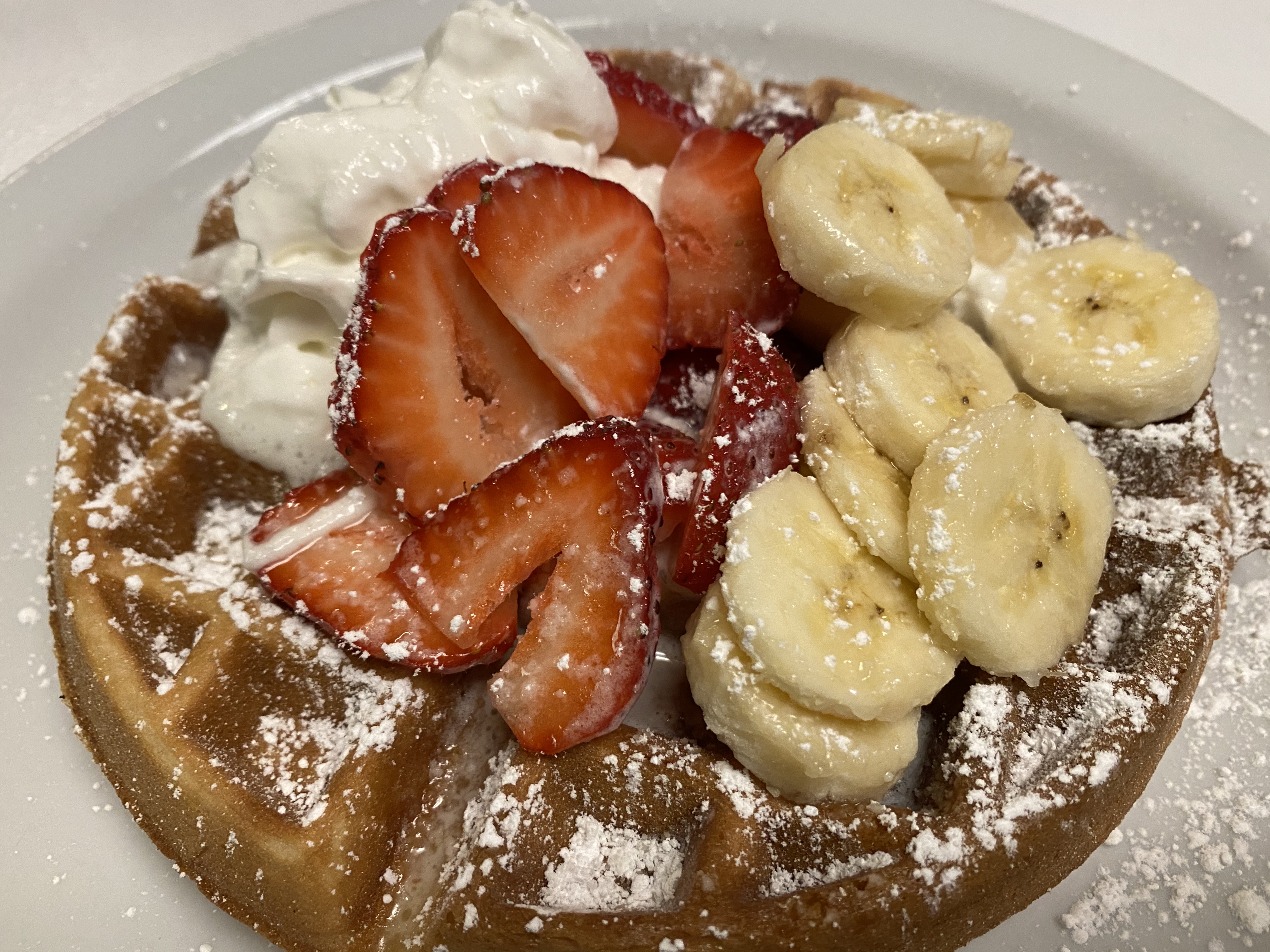 Order Belgian Waffle with Strawberry and Banana food online from Local Diner store, San Francisco on bringmethat.com