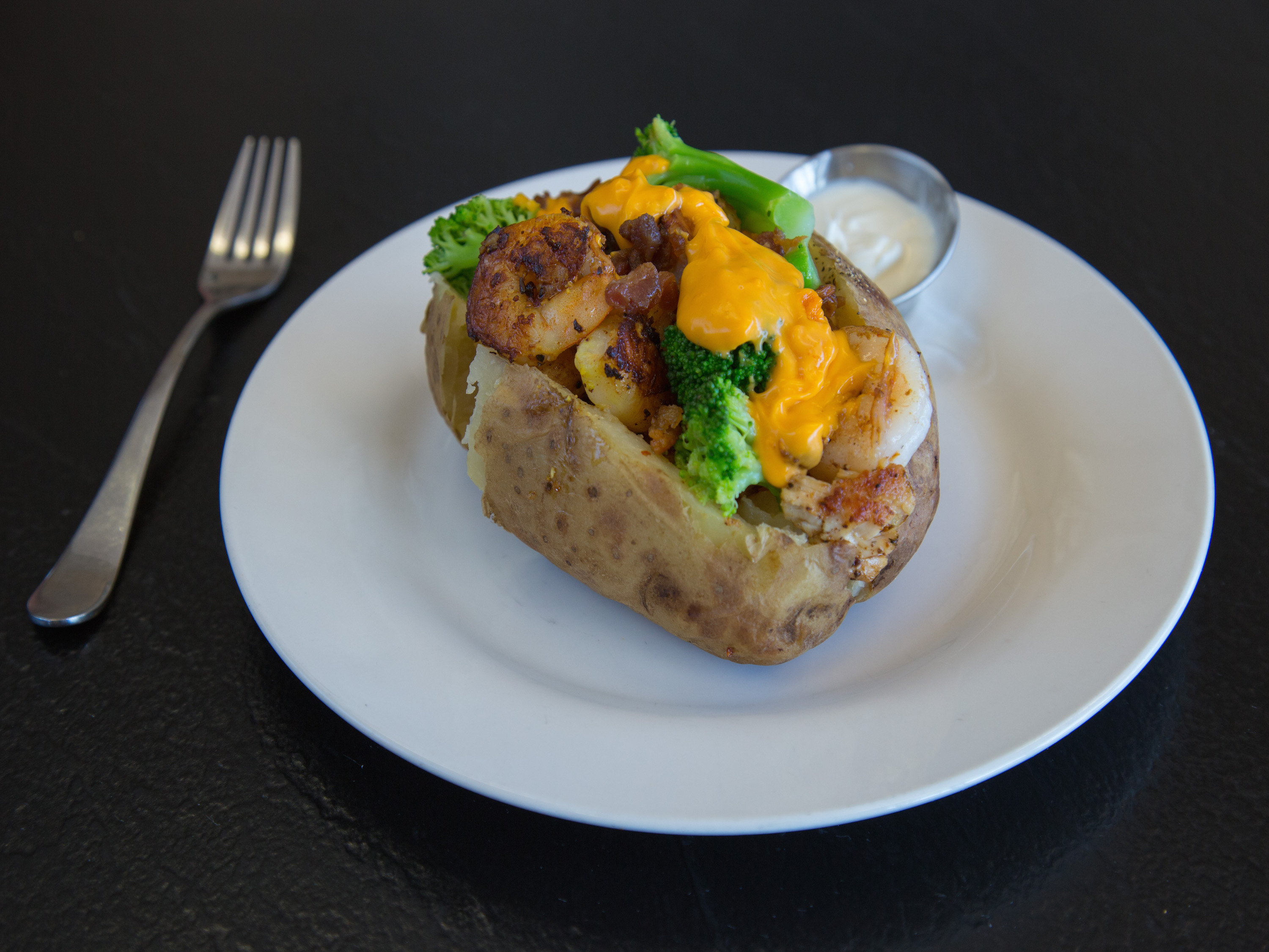 Order Baked Potato food online from Josanne Homestyle Kitchen store, Lexington on bringmethat.com
