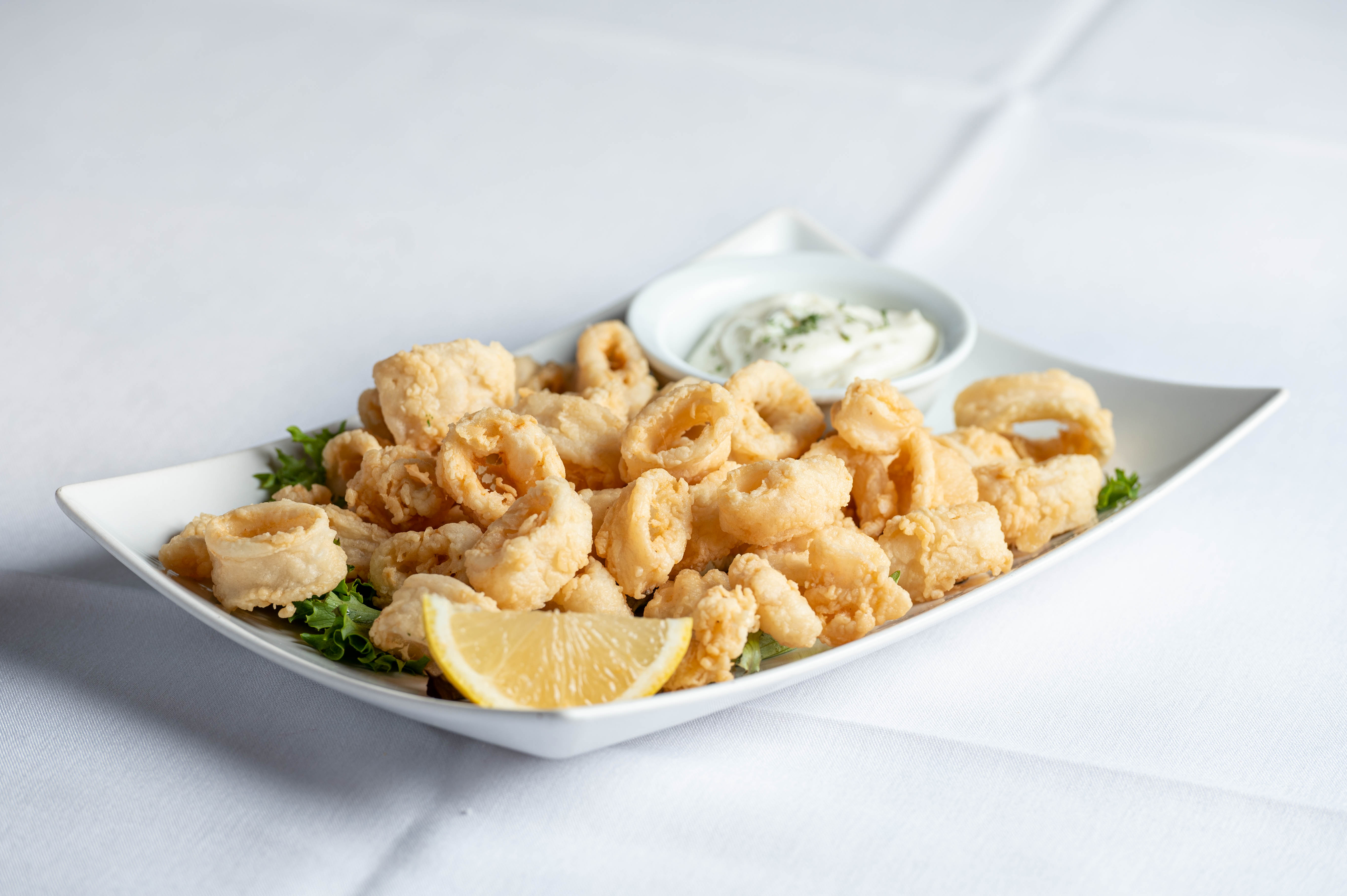 Order Calamares Fritos food online from Cafe Madrid store, Holladay on bringmethat.com