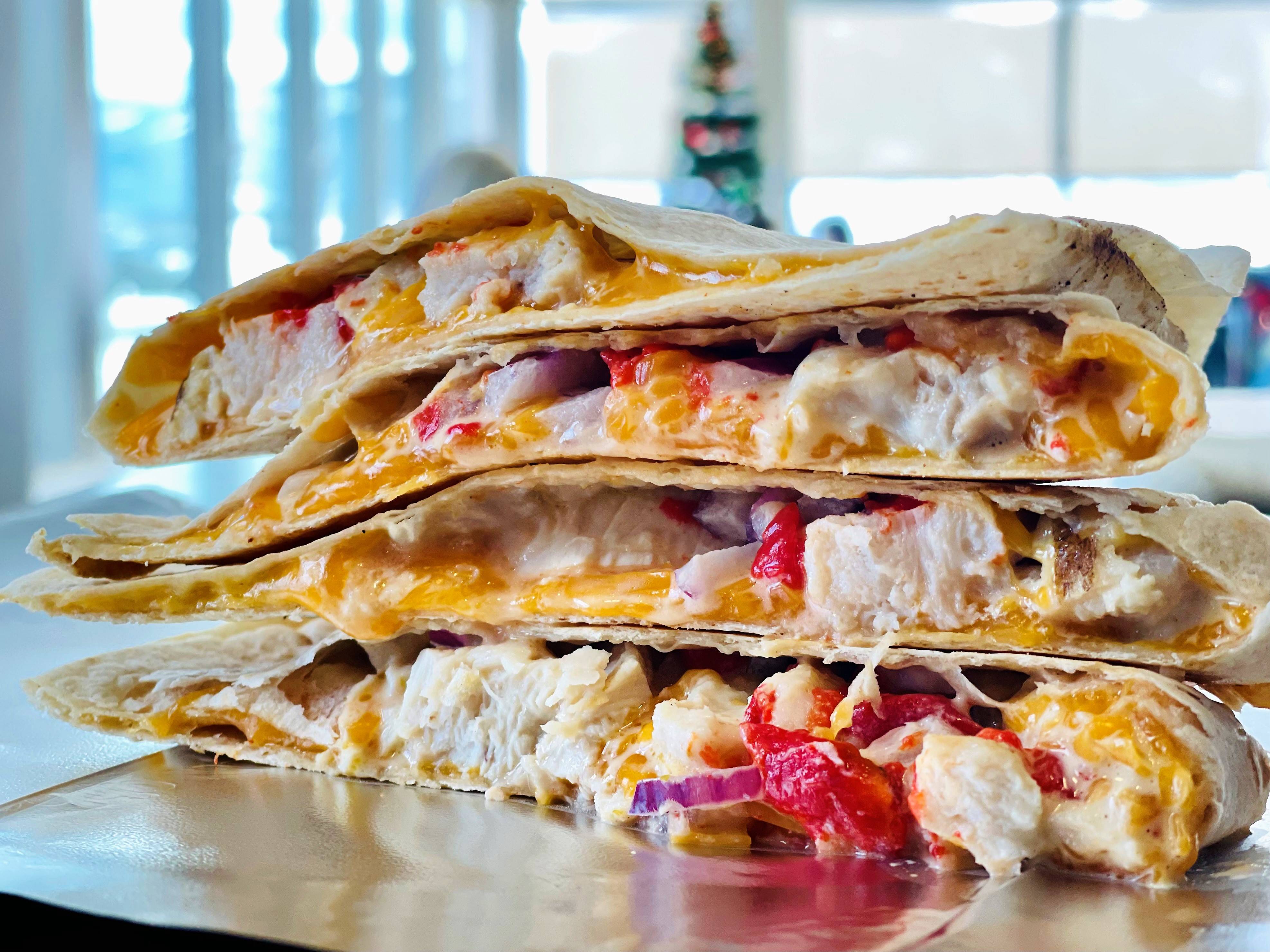 Order Grilled Chicken Quesadilla w/ Creamy Jalapeno Sauce  food online from Hugo Coffee Shop store, Park City on bringmethat.com